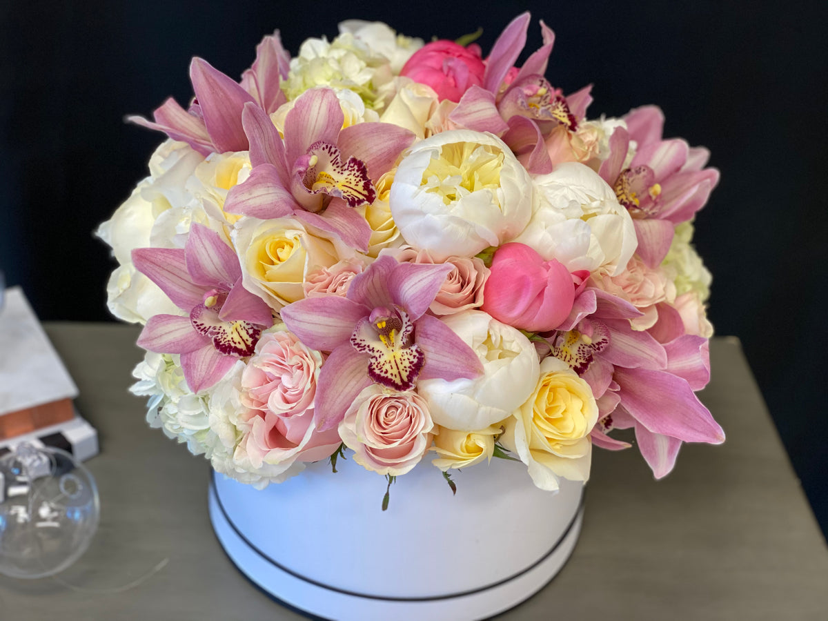 Luxury pink flower box with roses hydrangeas and peonies