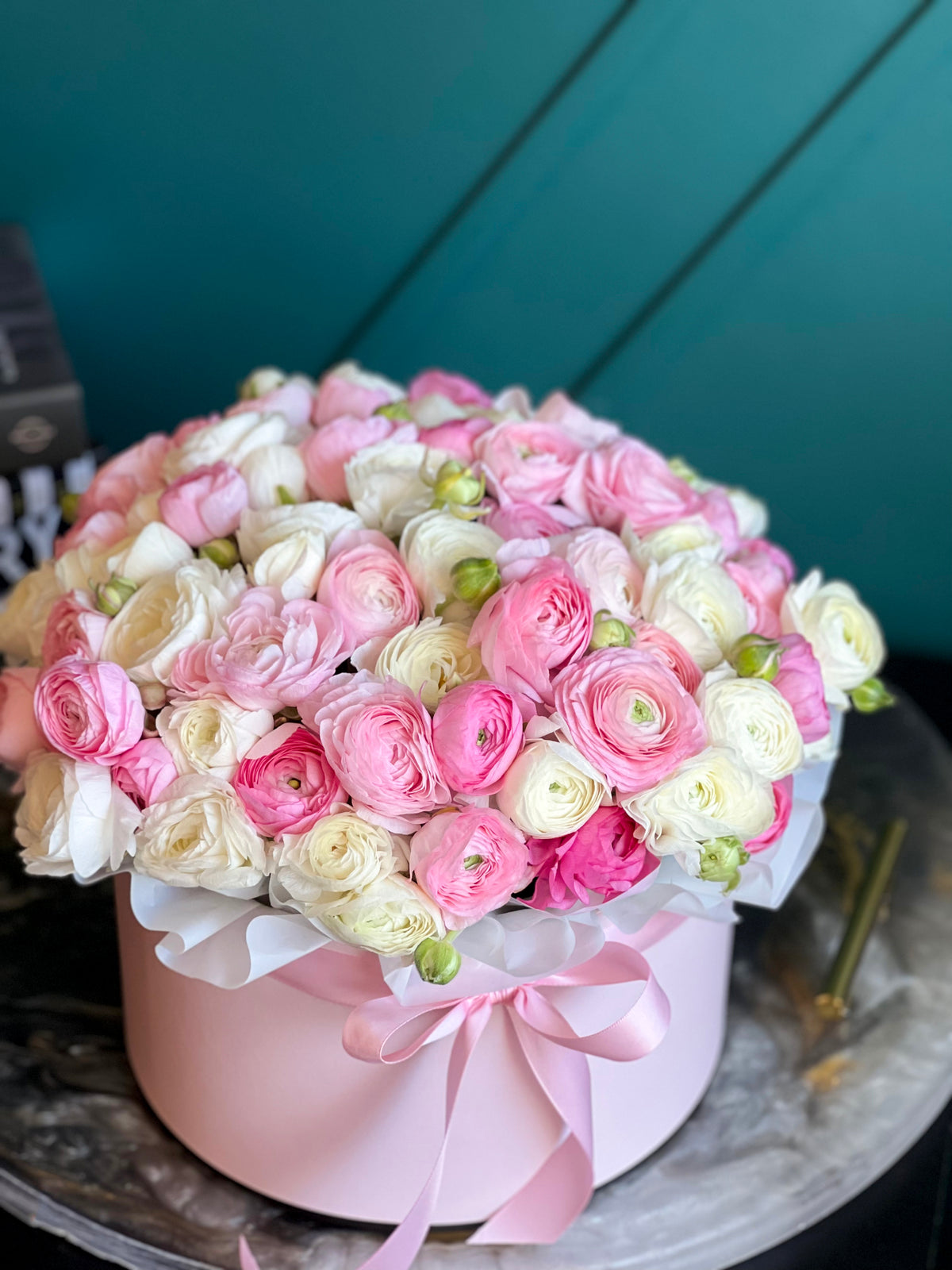 Luxury pink ranunculus arrangement by Luxury Flowers Miami