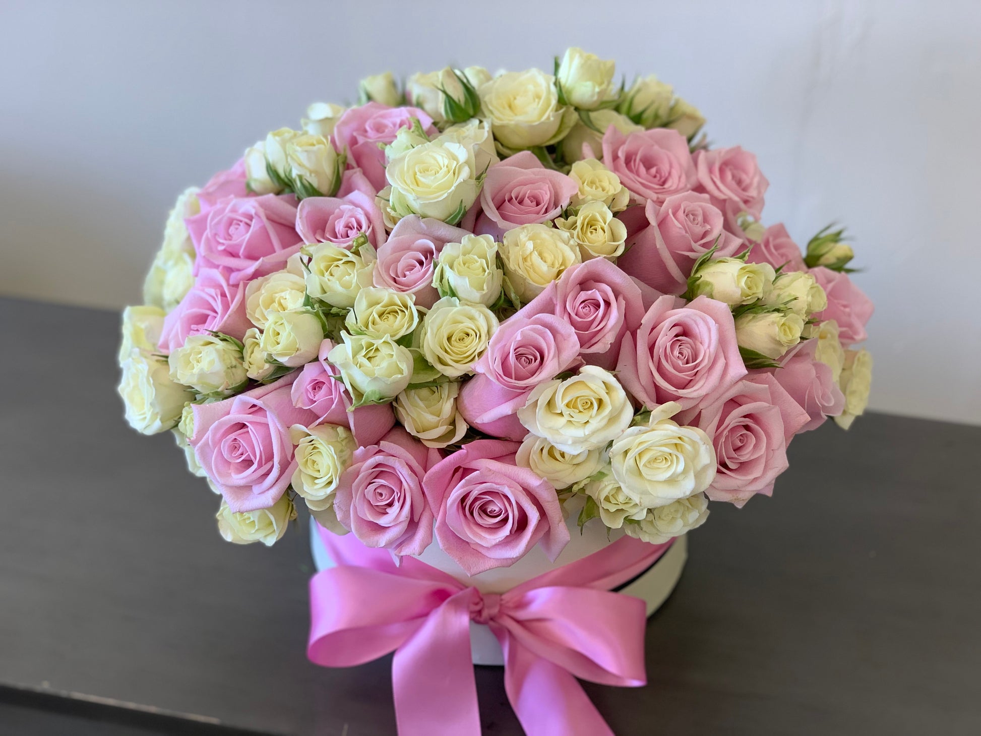 Luxury pink rose box with white spray roses Miami Beach