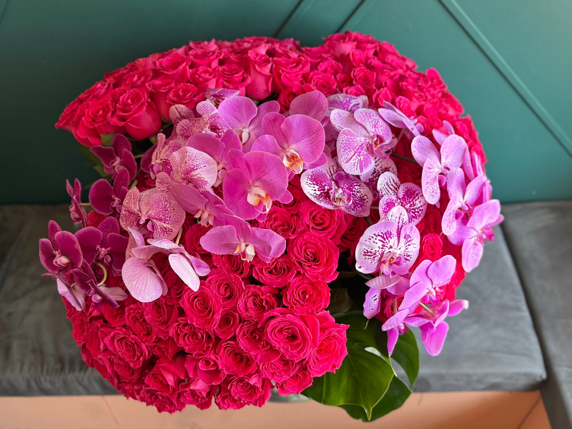Luxury pink roses and Phalaenopsis orchid flower arrangement Miami