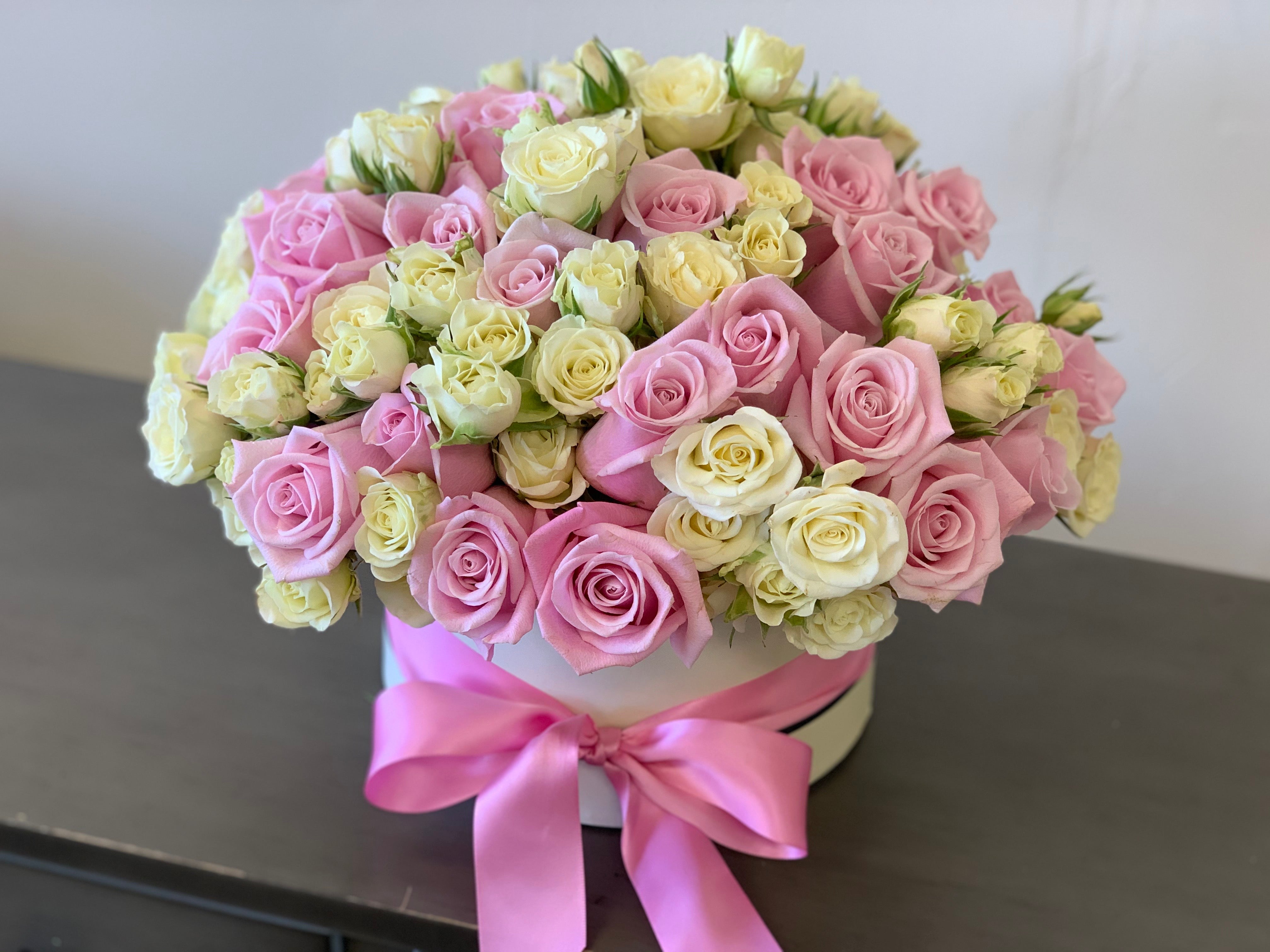 Luxury pink roses with white spray roses handcrafted in Miami