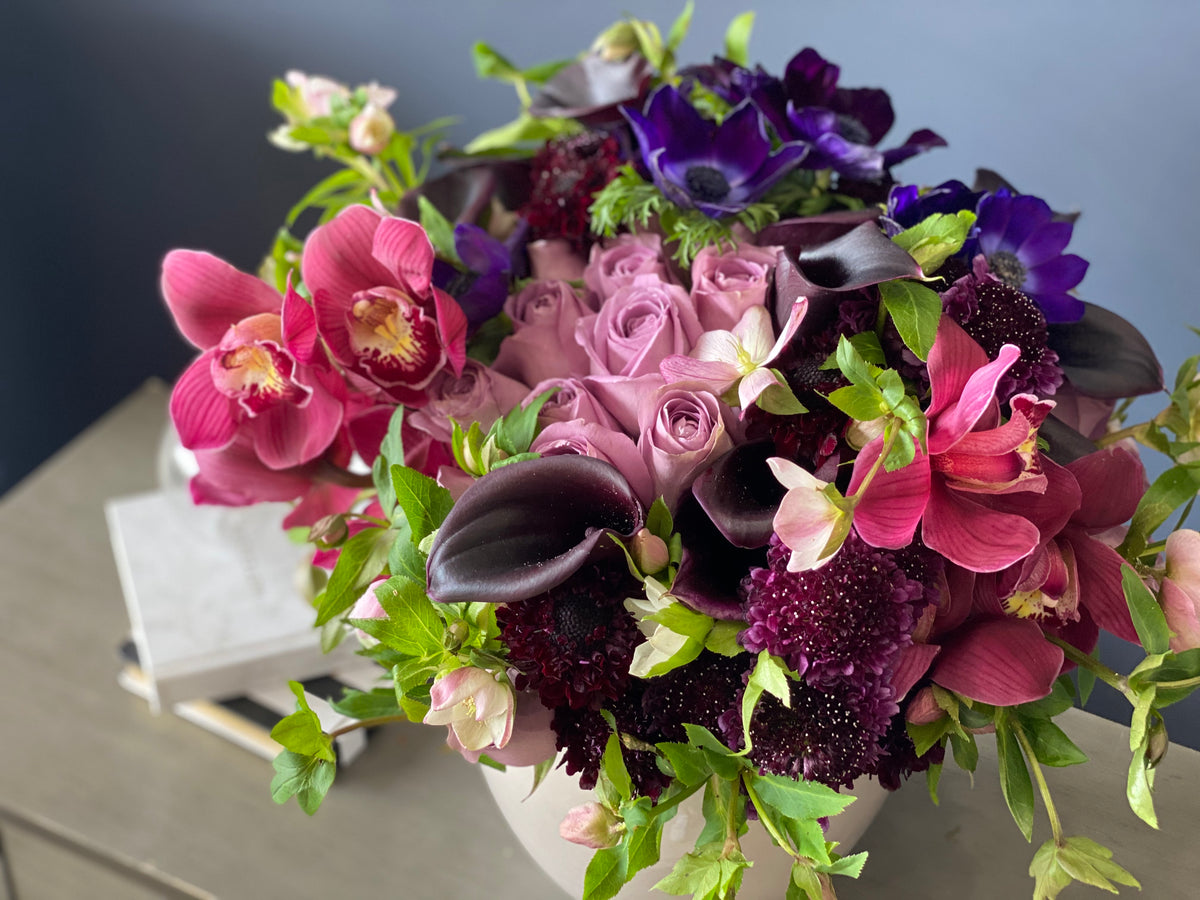 Luxury purple floral arrangement by Luxury Flowers Miami