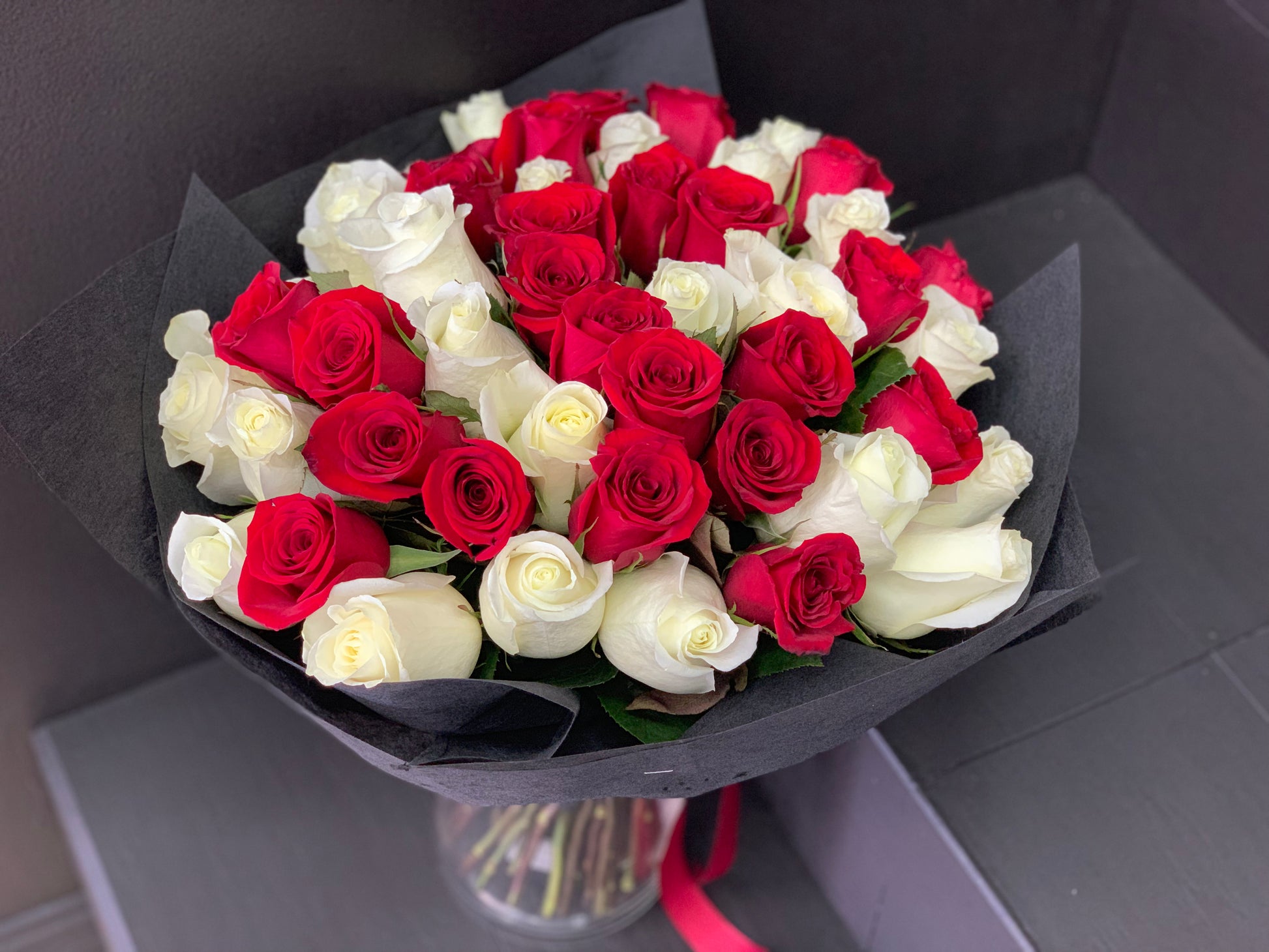 Luxury red and white rose bouquet handcrafted in Miami Beach