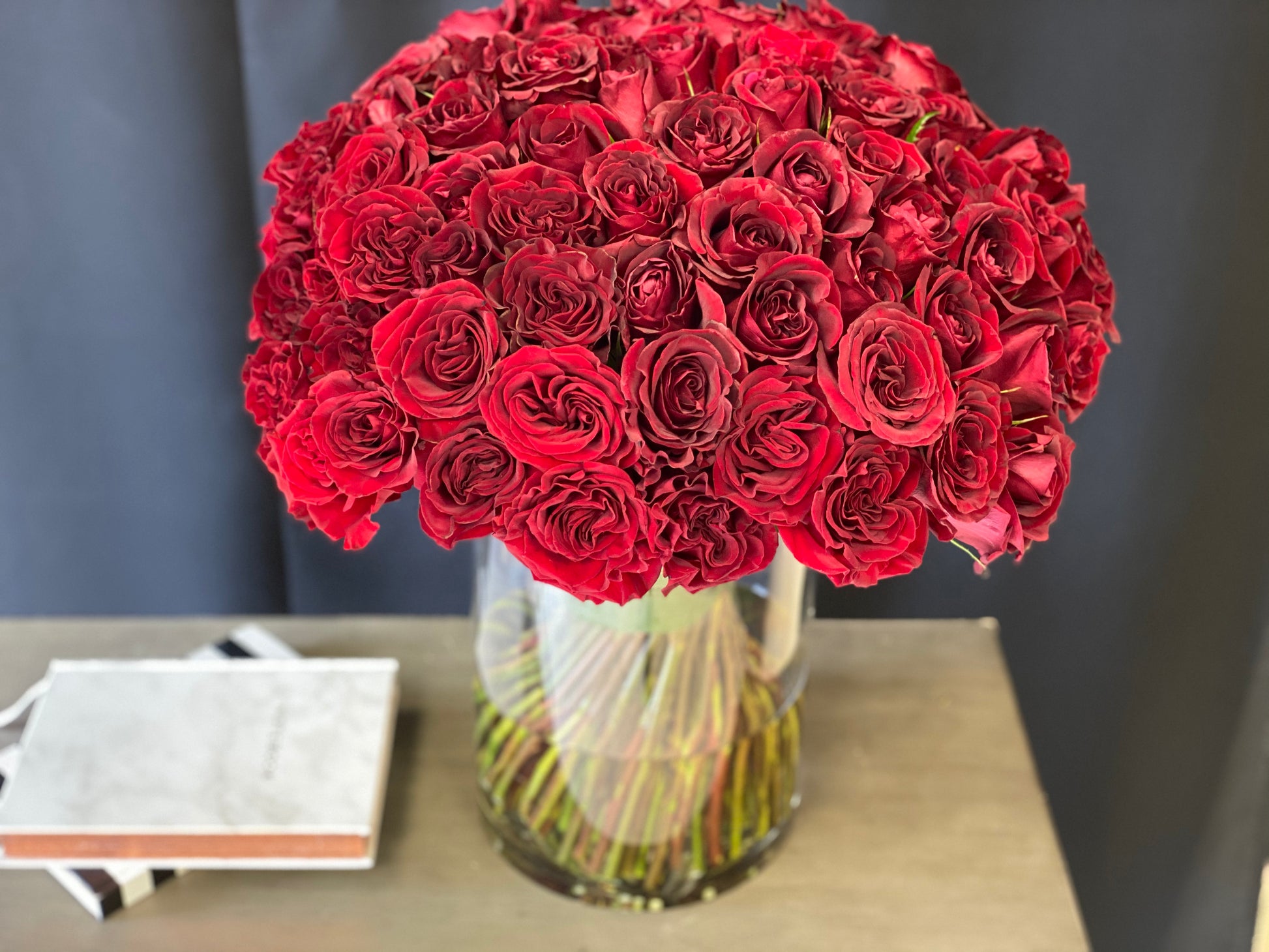 Luxury red rose arrangement with 50 roses in a vase