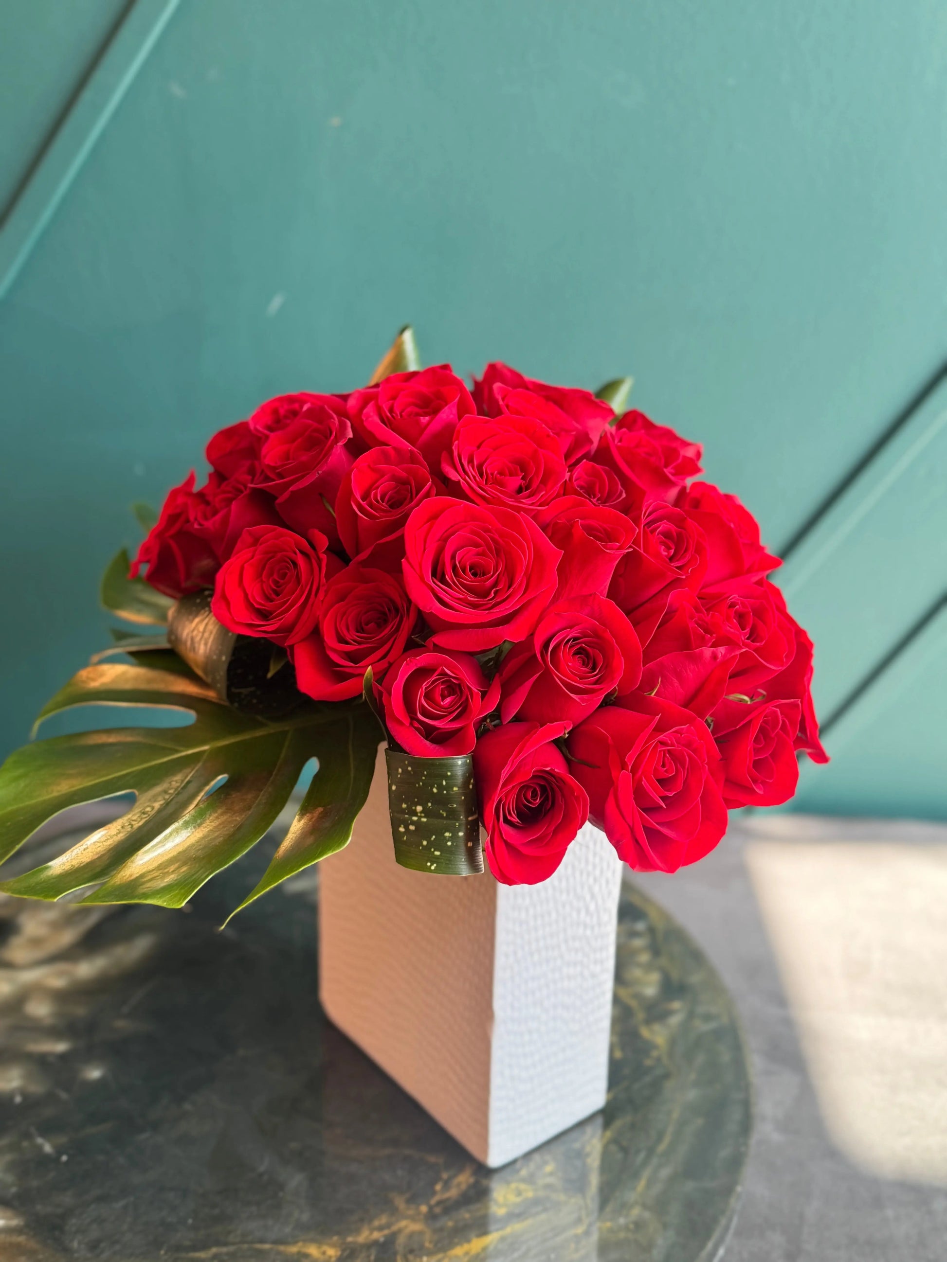 Luxury red rose bouquet with fresh greenery