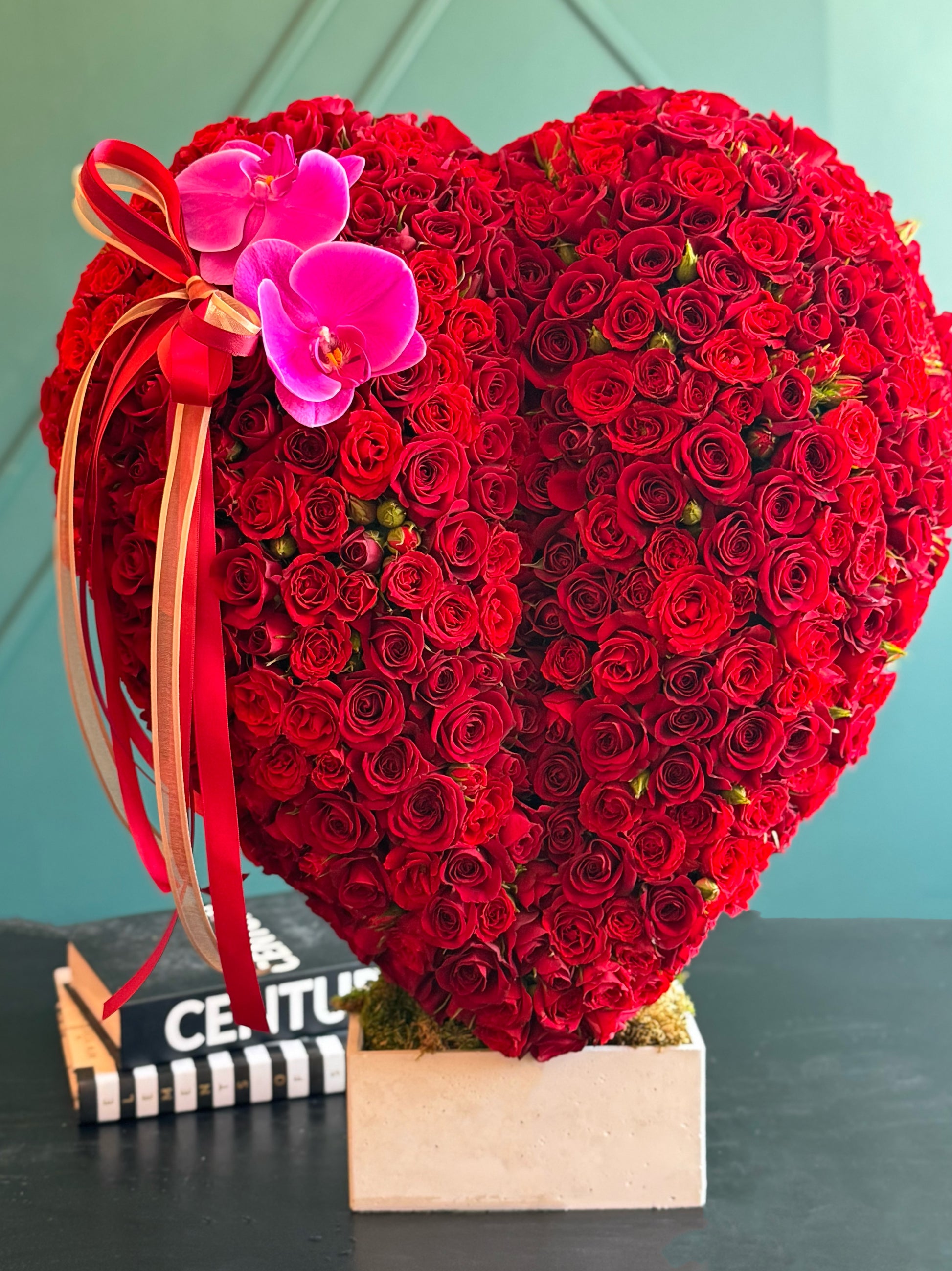 Luxury red roses arranged as three-dimensional heart