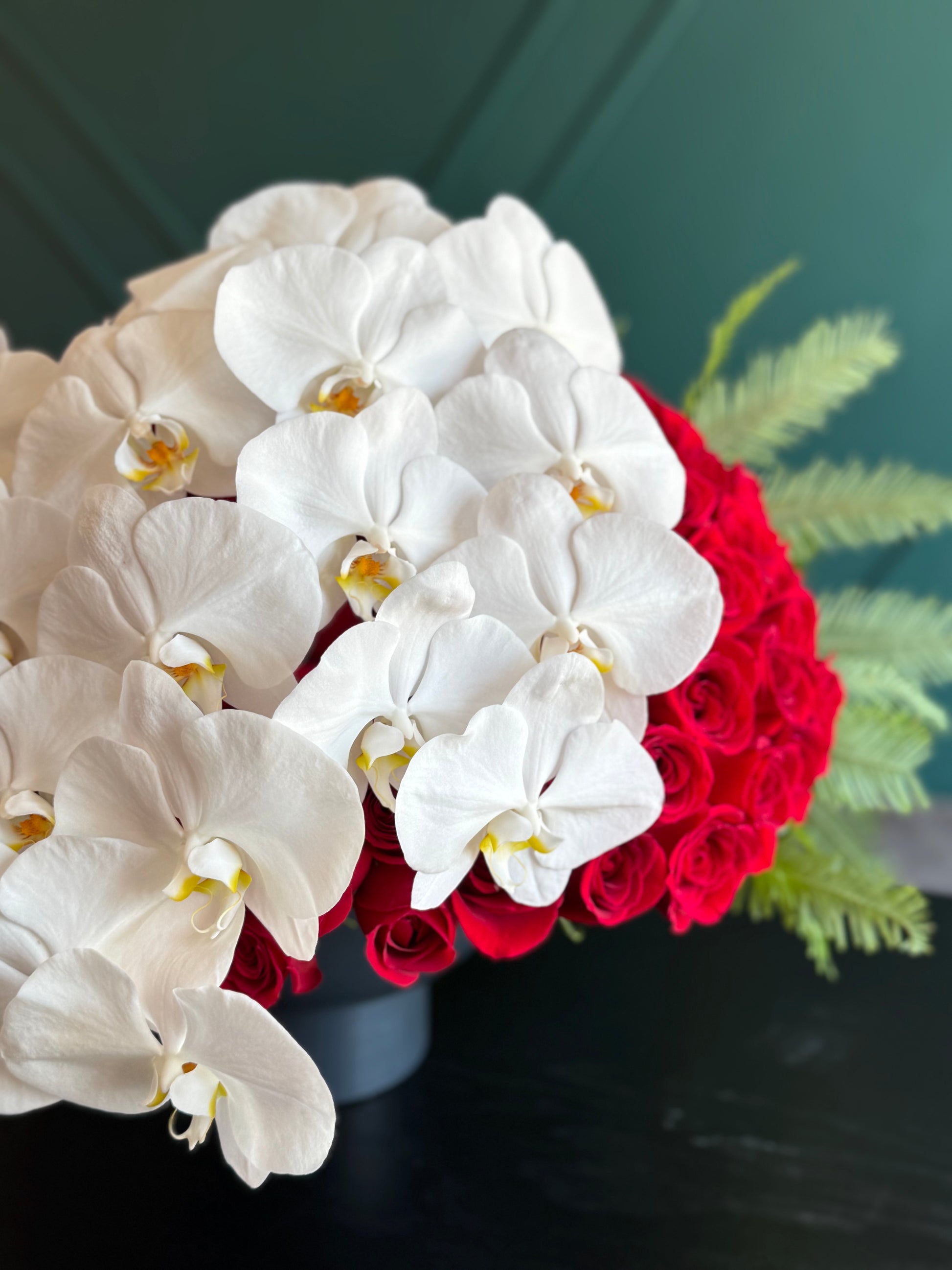 Luxury romantic red roses and white orchids for Miami flower delivery