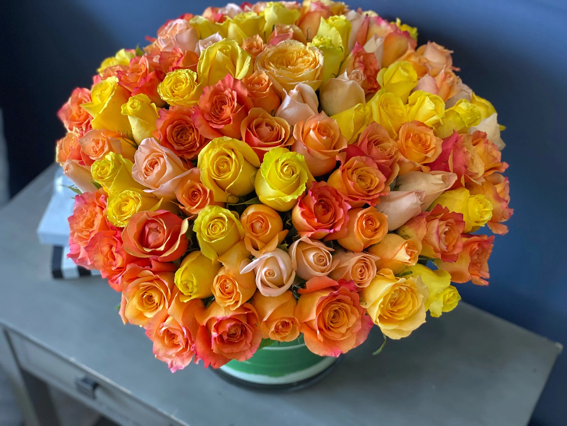 Luxury rose delivery Miami with 100 yellow and orange roses