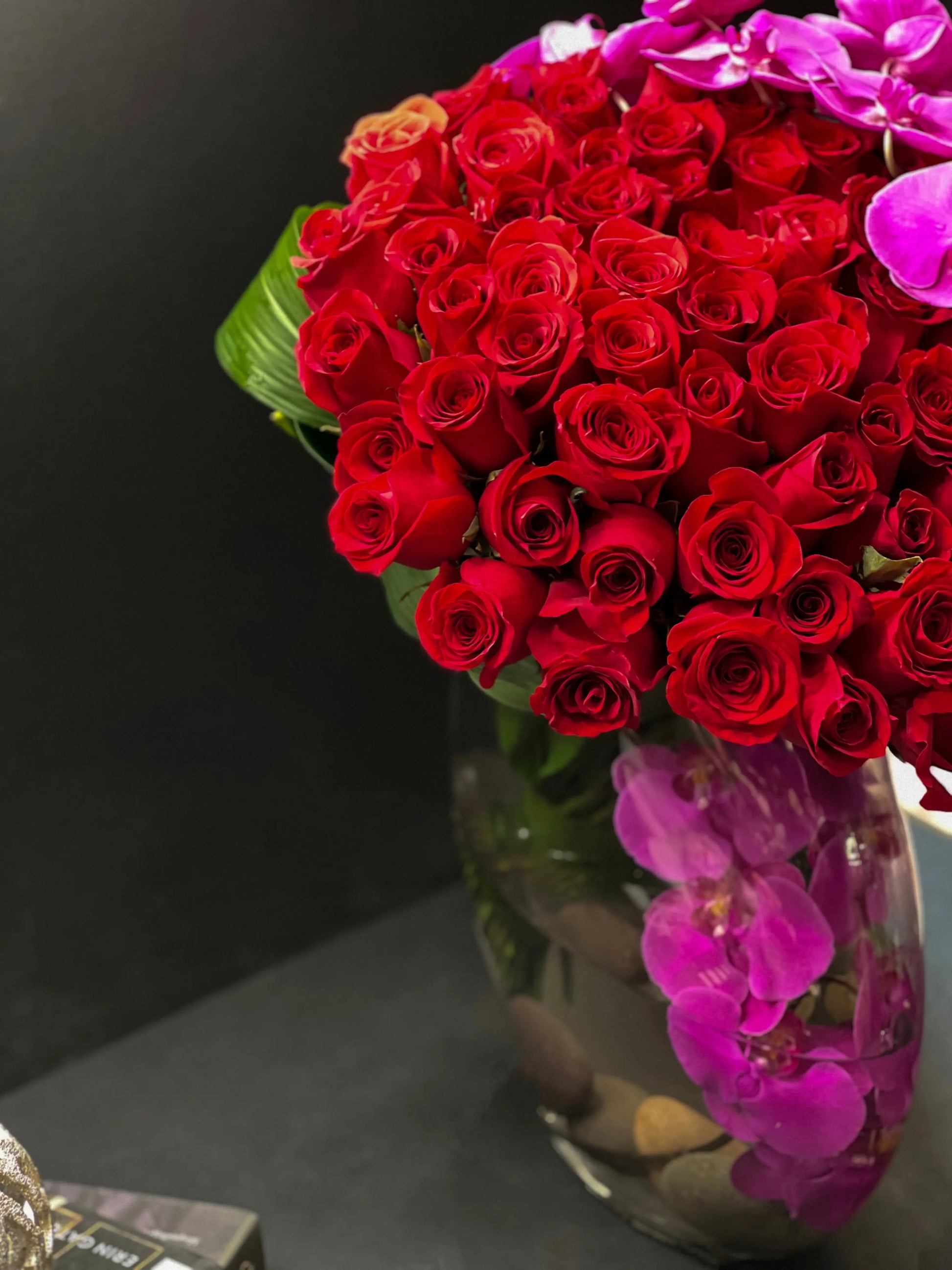 Luxury roses and orchids Miami Love Waterfall flower arrangement
