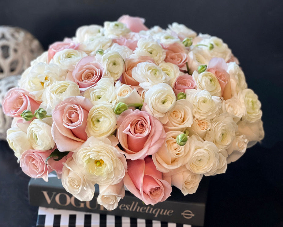 Luxury roses and ranunculus cement bowl arrangement Miami