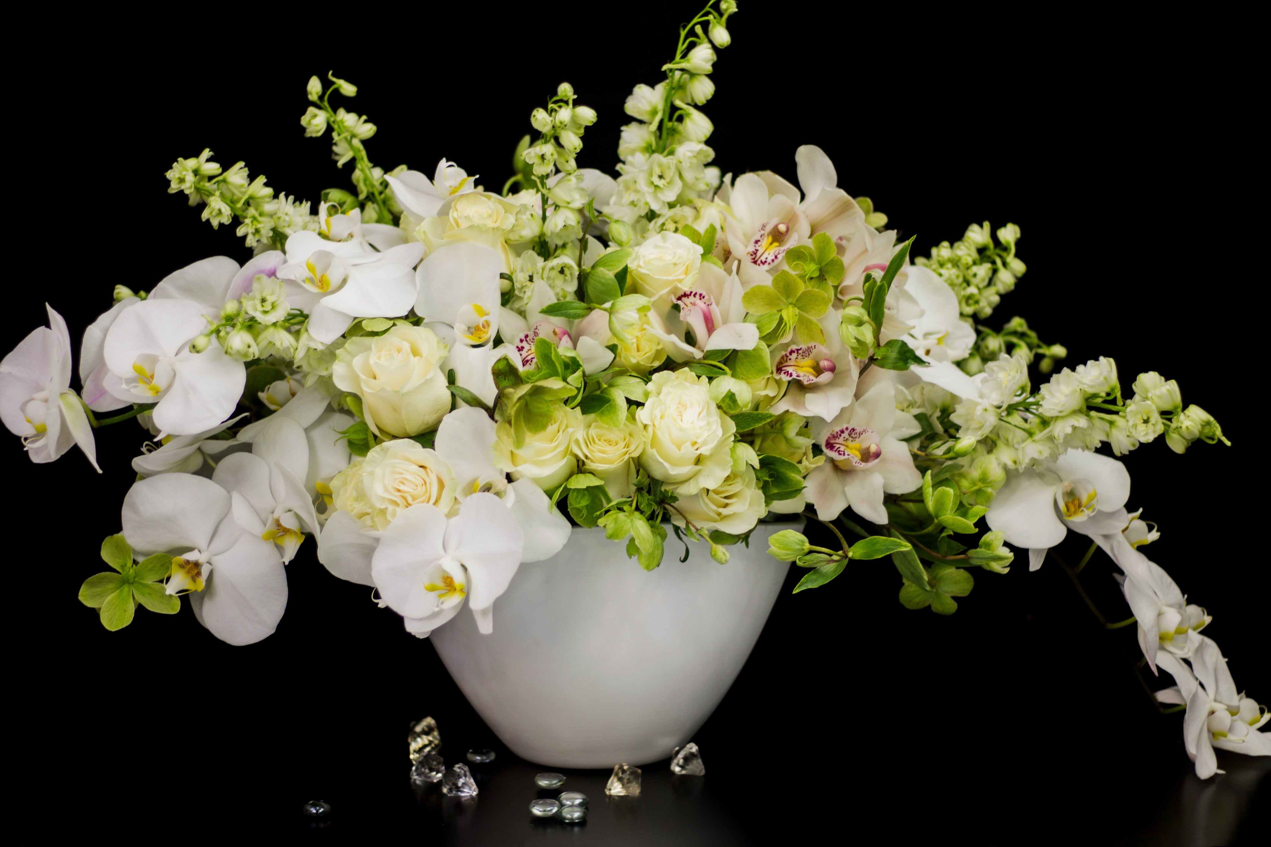 Luxury white flower arrangement Miami with orchids and roses