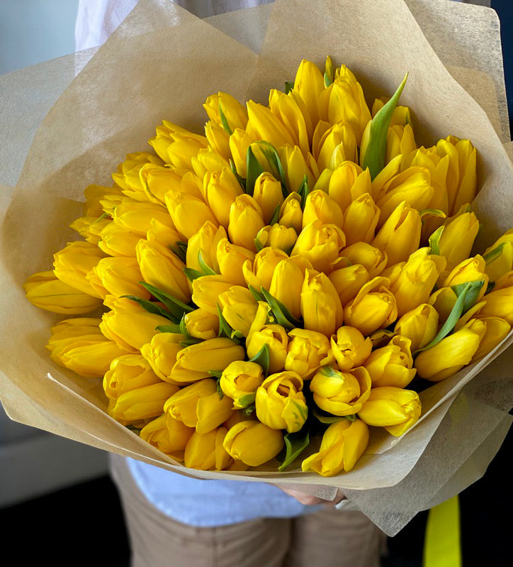 Luxury yellow tulip bouquet with elegant wrapping