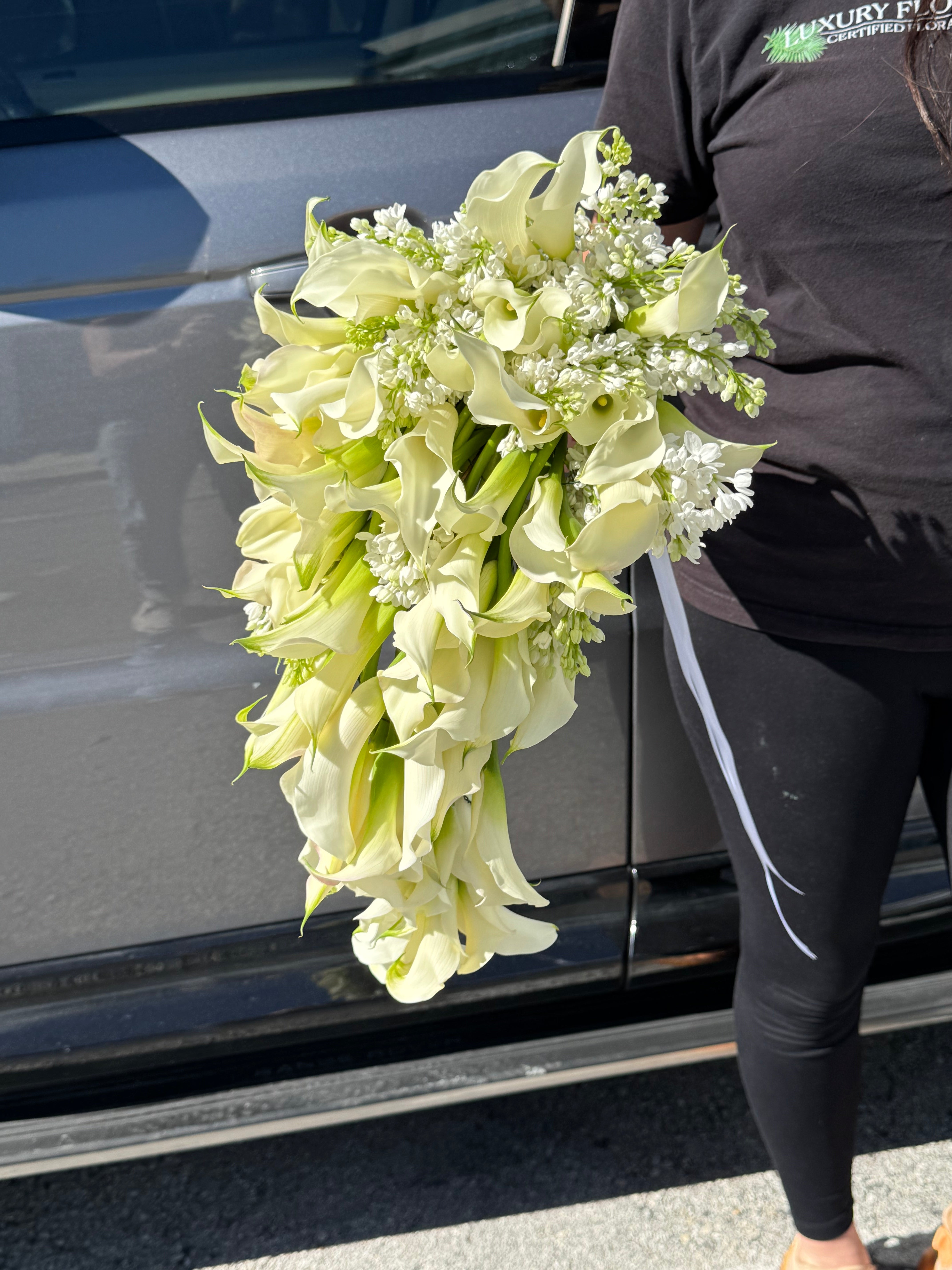 Mini calla lilies and lilac cascading wedding bouquet