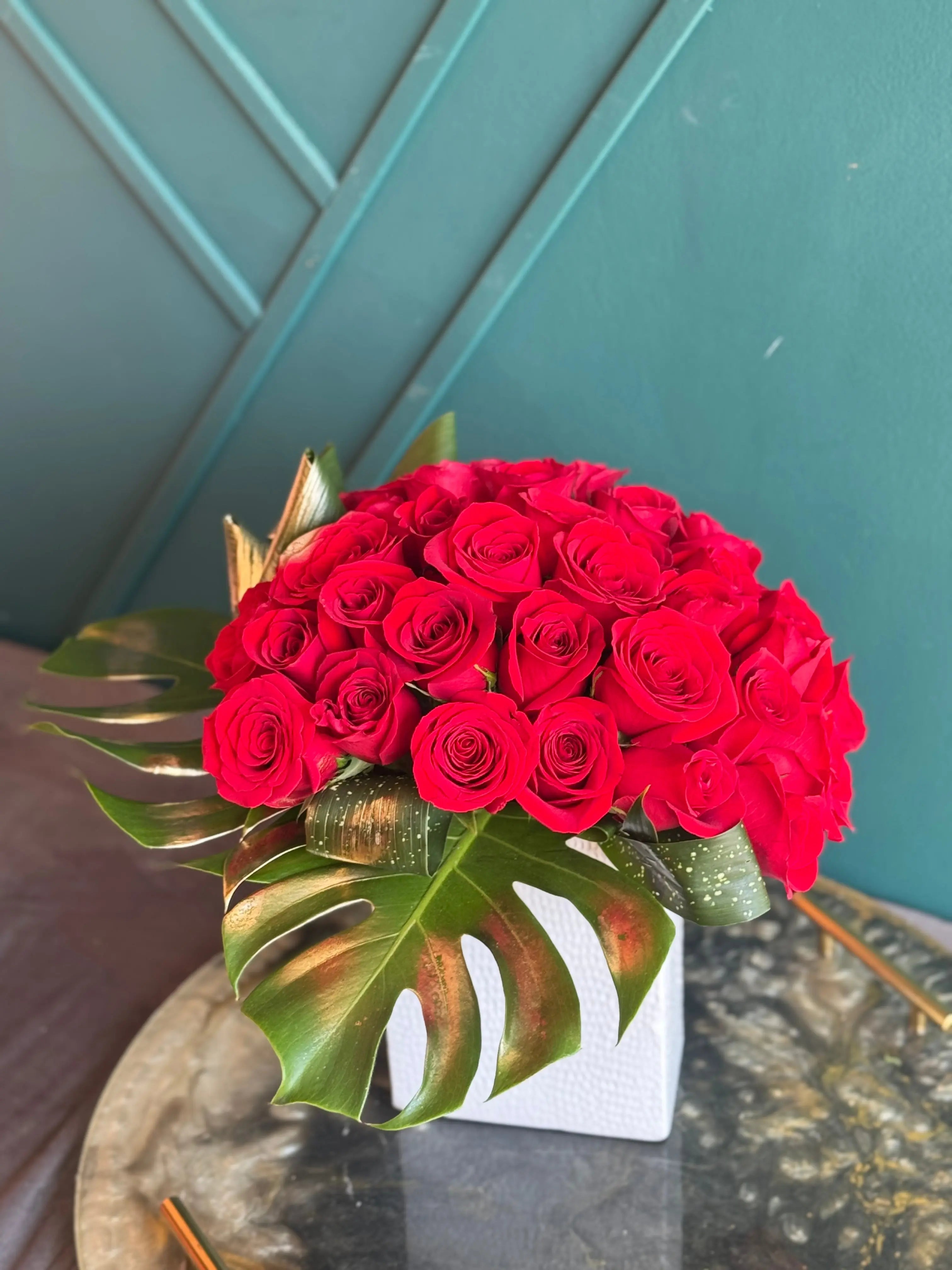 Modern floral design with 36 red roses