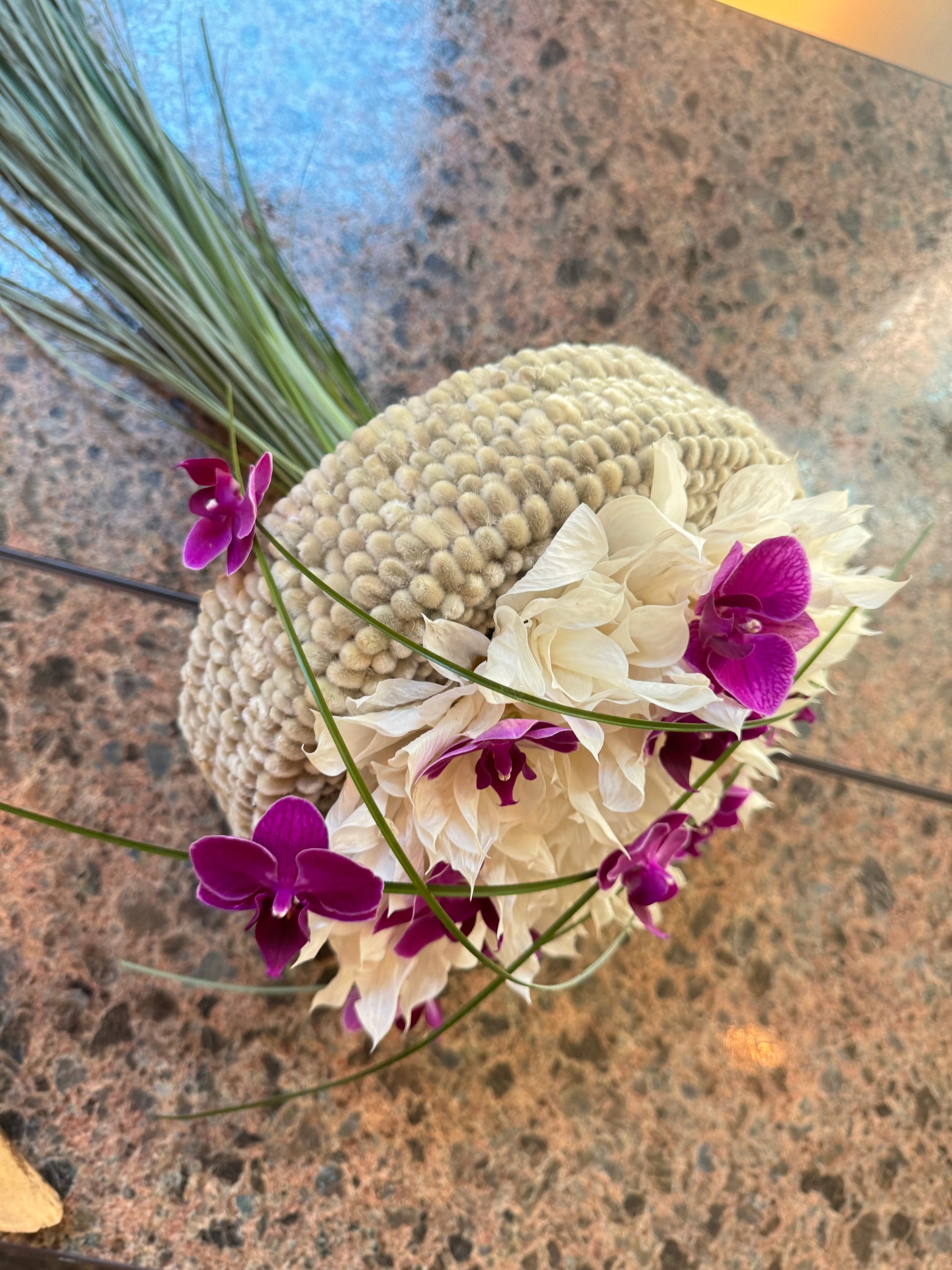 Modern orchid wedding bouquet with preserved botanical details