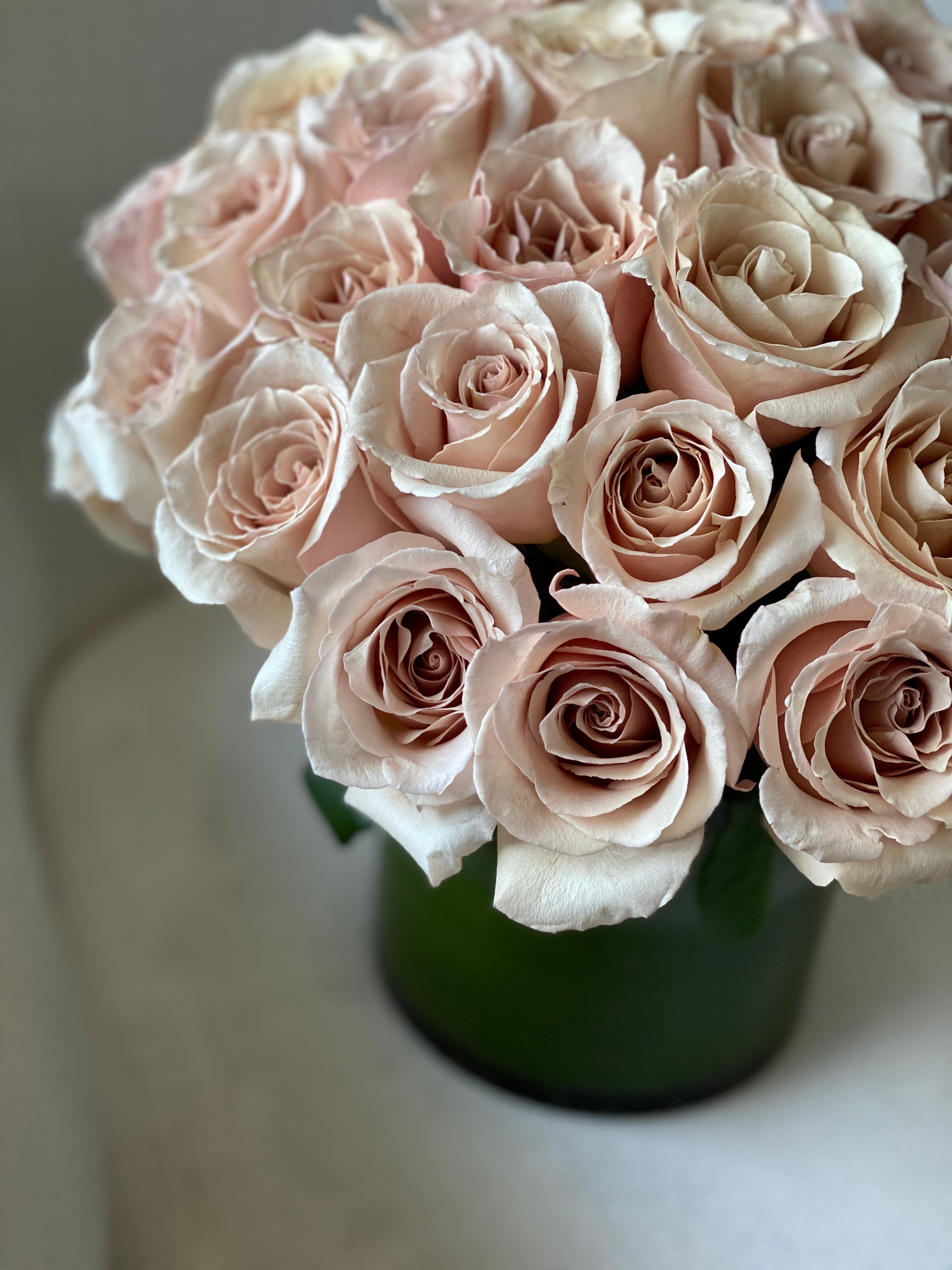 Modern vase arrangement with beige mocha and blush roses
