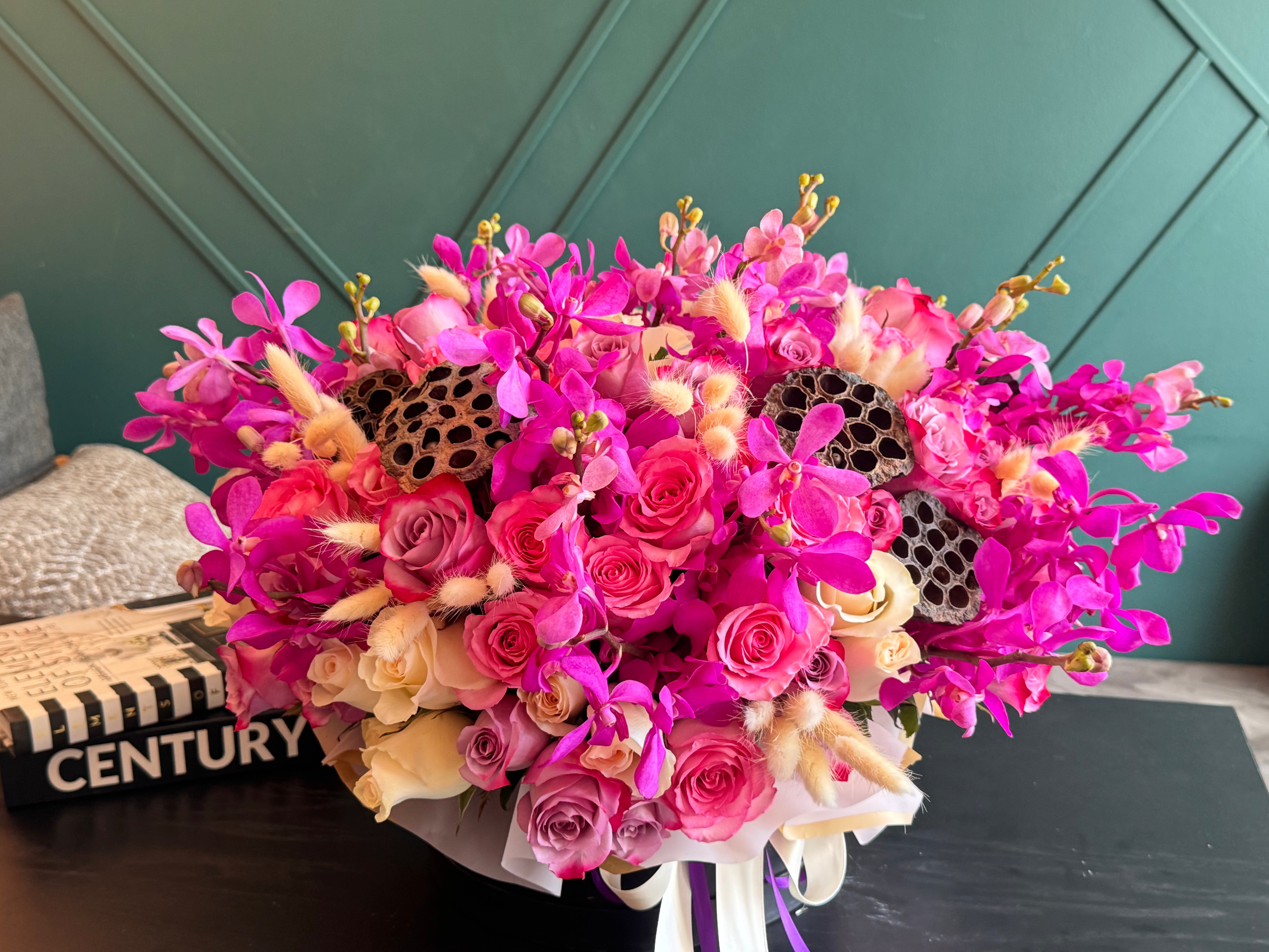 Mokara orchids and roses arrangement in Miami
