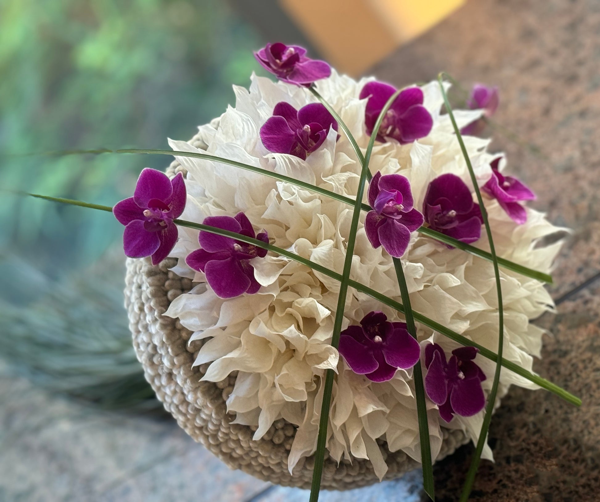 One-of-a-kind handcrafted wedding bouquet with orchids
