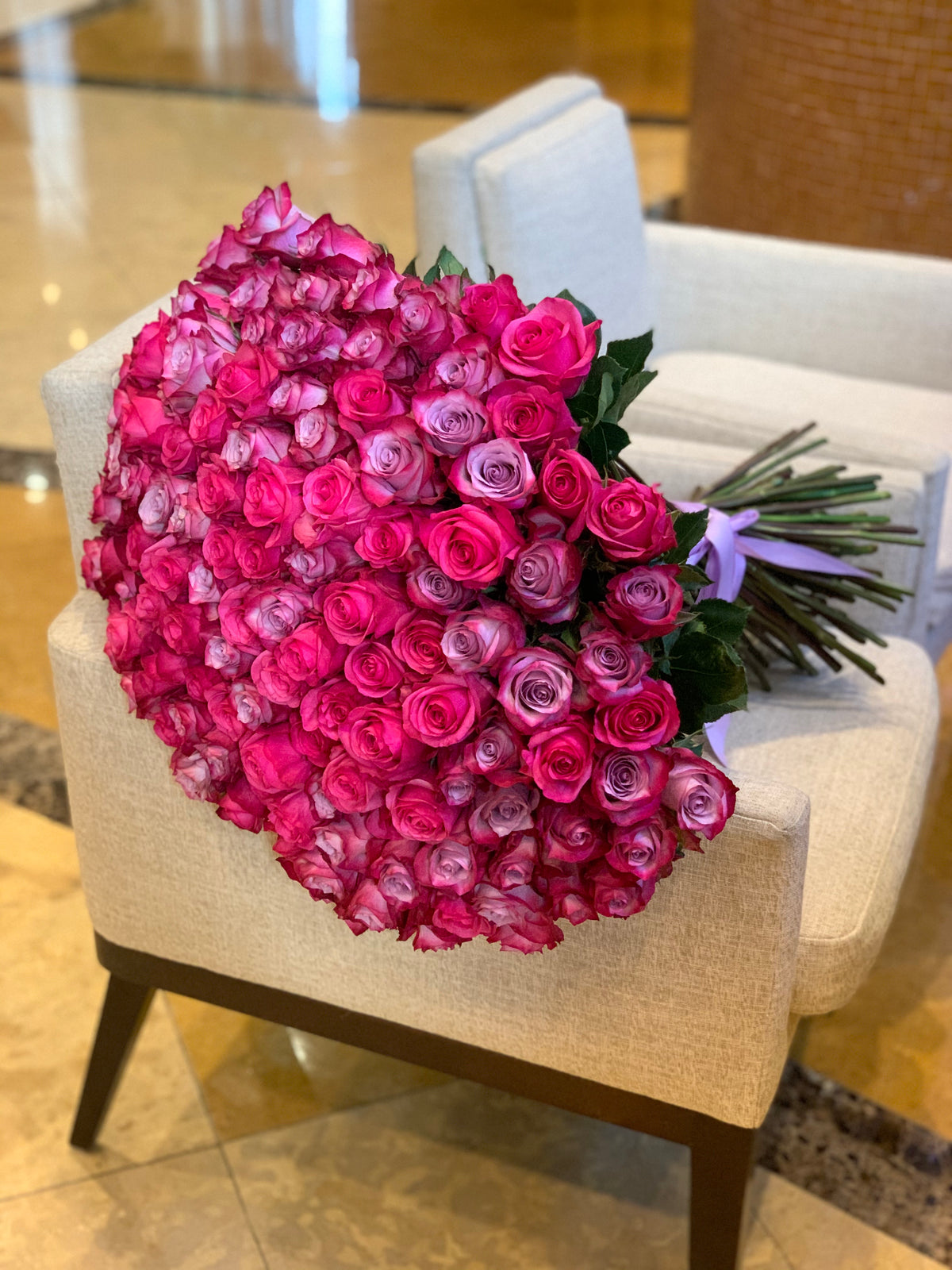 Oversized bouquet of 150 hot pink and purple roses