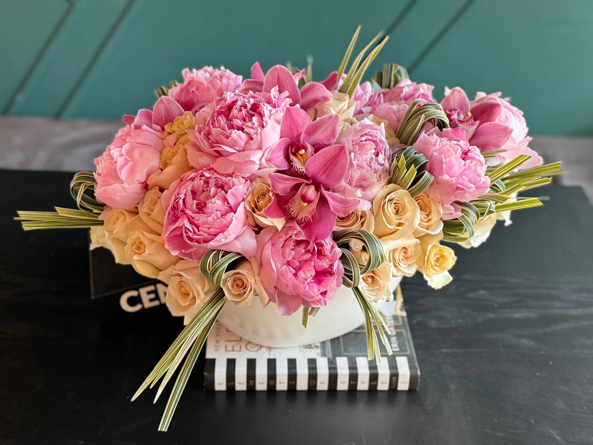 Peonies cappuccino roses and orchids in ceramic vase by Luxury Flowers Miami