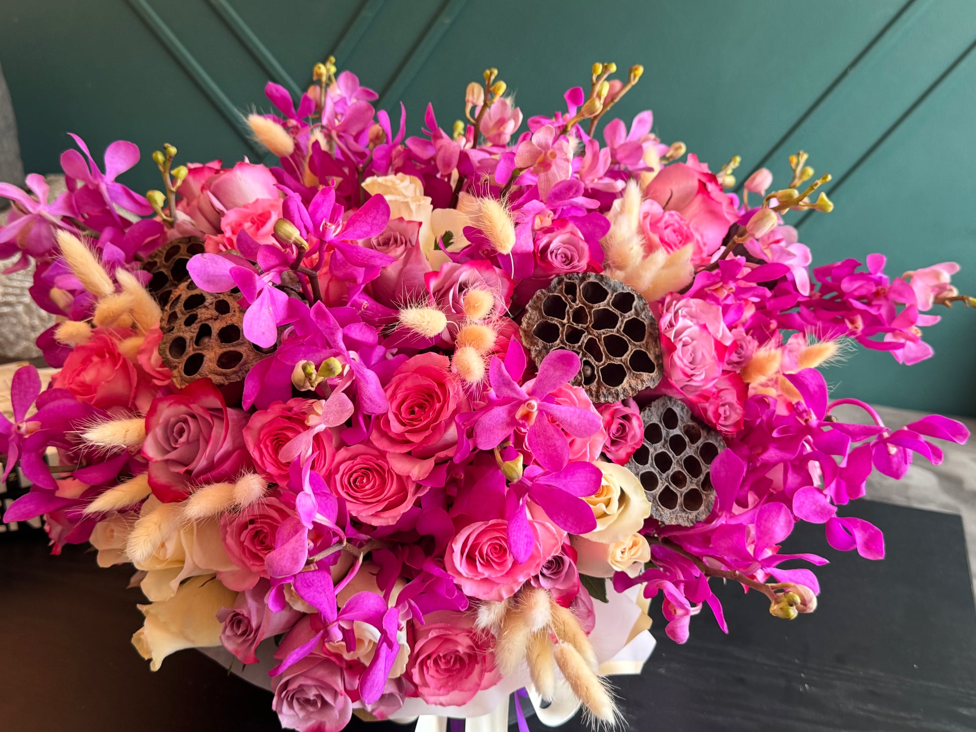 Pink Mokara orchids and roses luxury flower arrangement