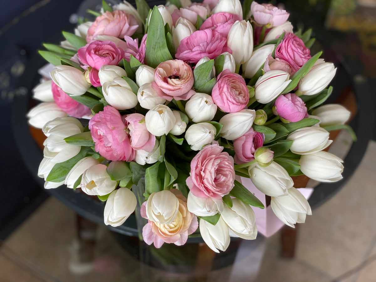 Pink and white seasonal flower arrangement for delivery in Miami