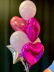 Pink foil and latex balloon bouquet with heart and star balloons by Luxury Flowers Miami