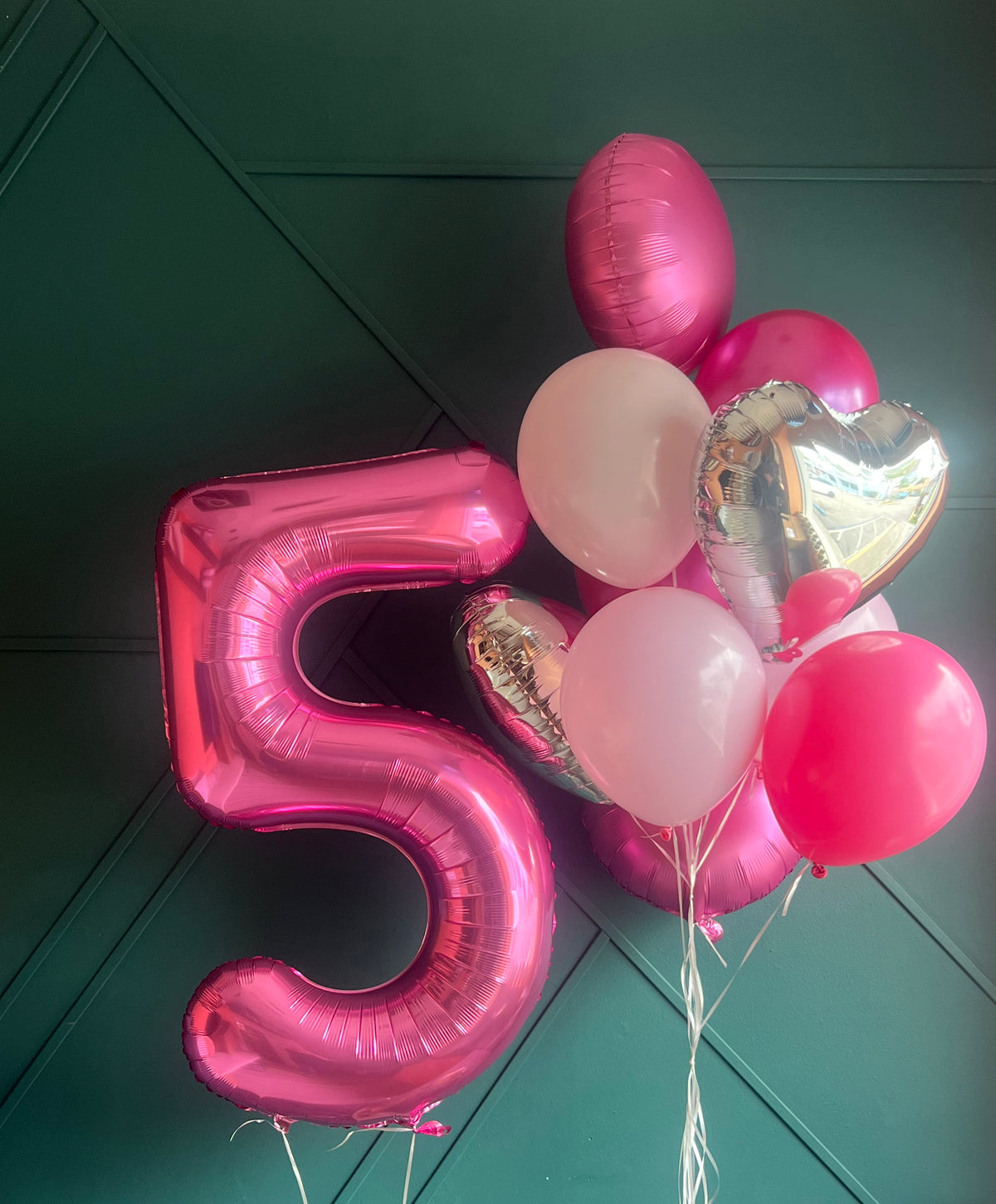 Pink number balloon bouquet for birthday celebration
