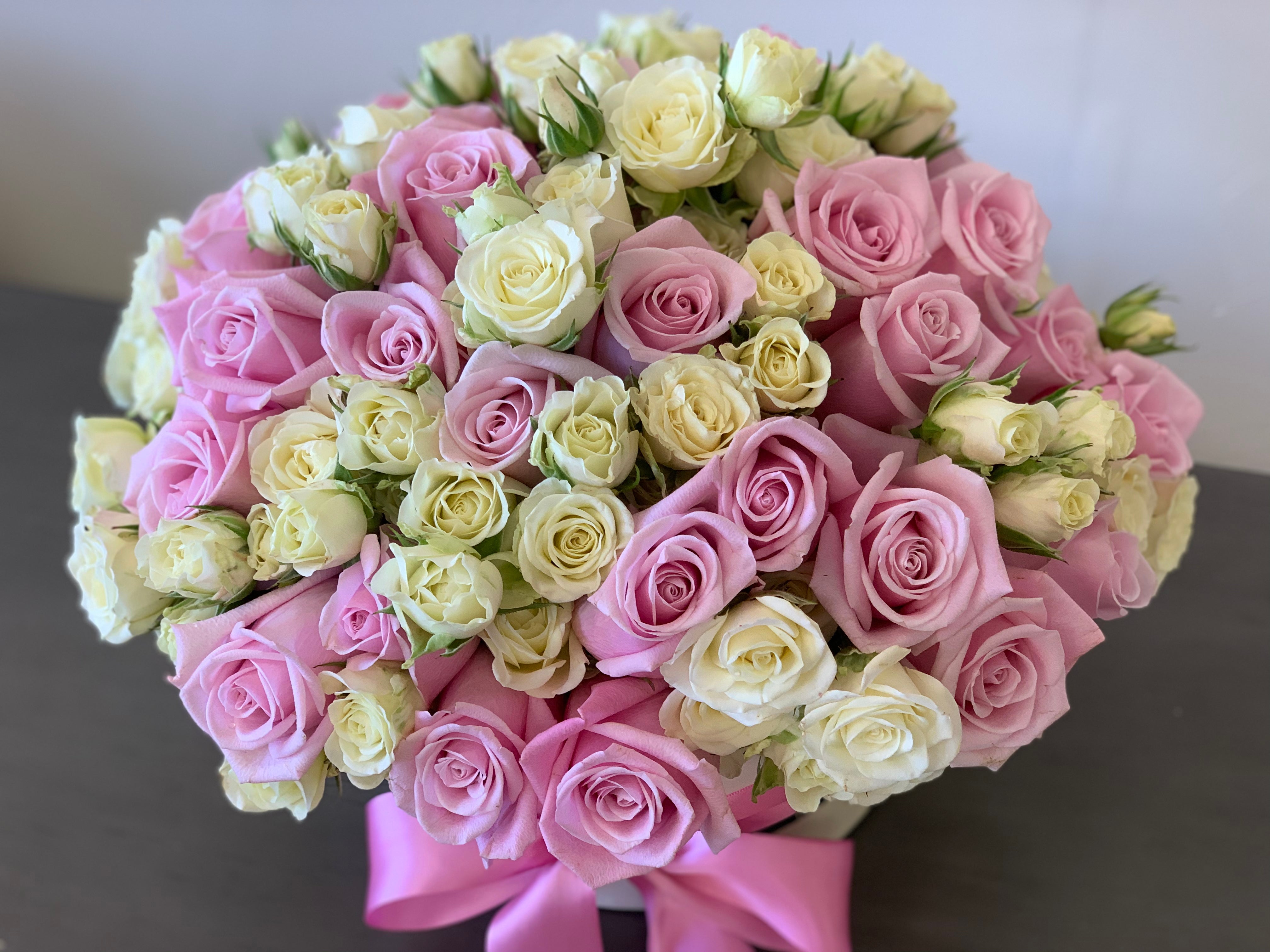 Pink roses and white mini roses arrangement for Miami delivery