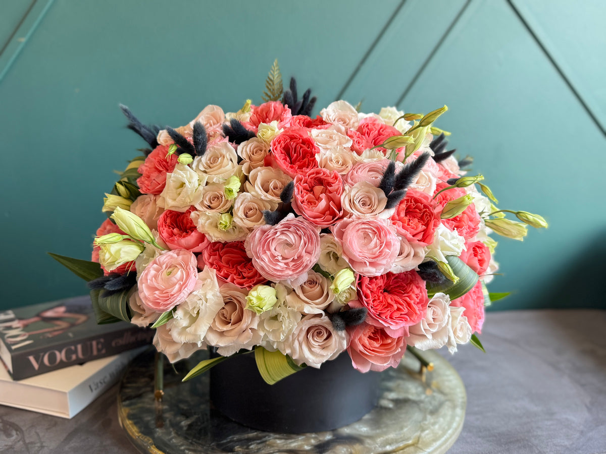 Pink roses ranunculus and lisianthus flower arrangement