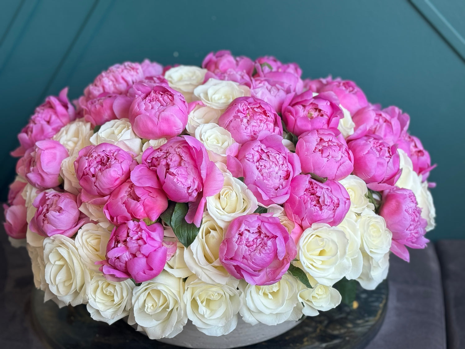 Premium floral arrangement with white roses and blush pink peonies