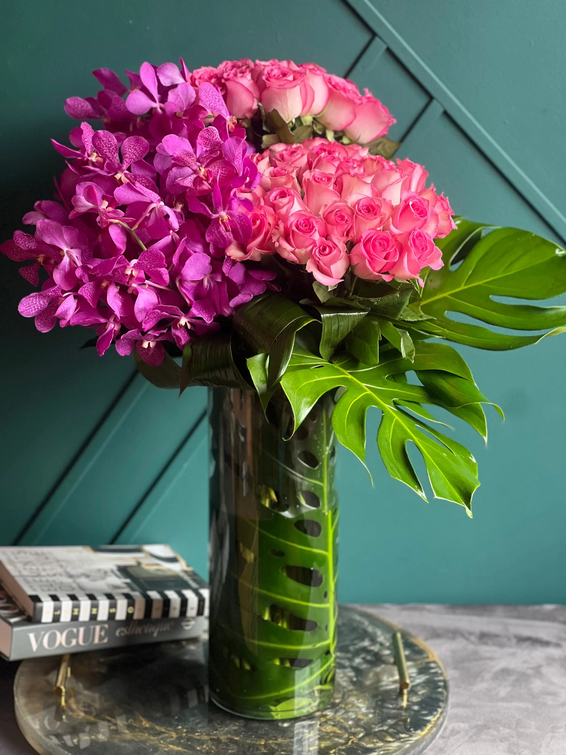 Premium pink roses with purple mokara orchids
