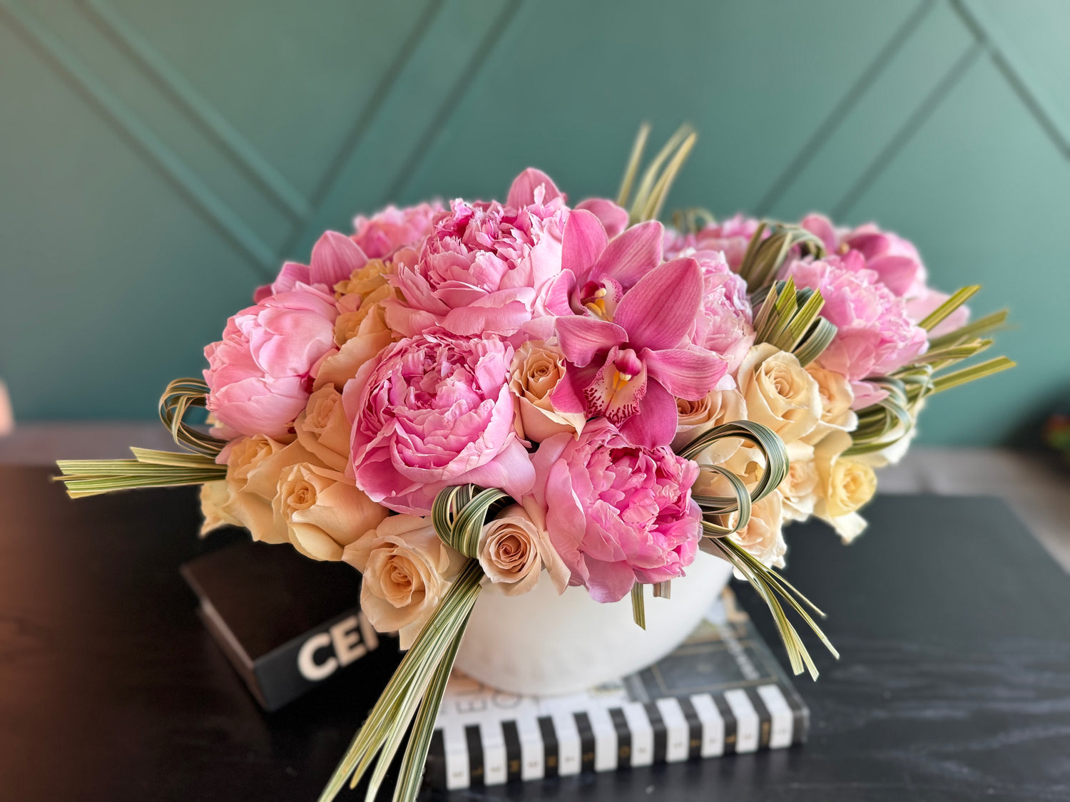 Premium vase arrangement with peonies roses and orchids for flower delivery in Miami