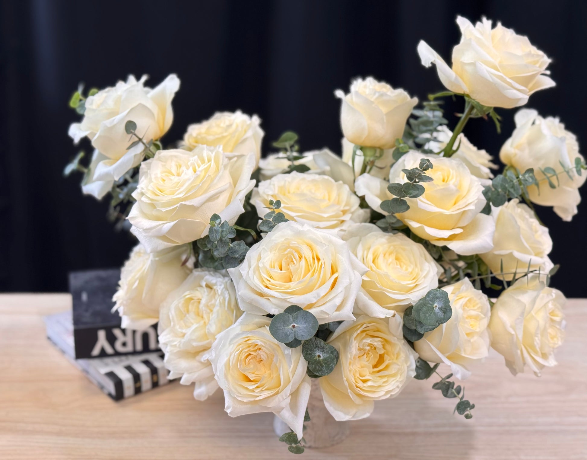 Premium white French roses with delicate greenery