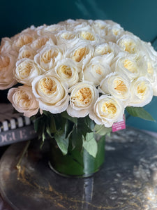 Premium white and cream garden roses in a luxury floral design