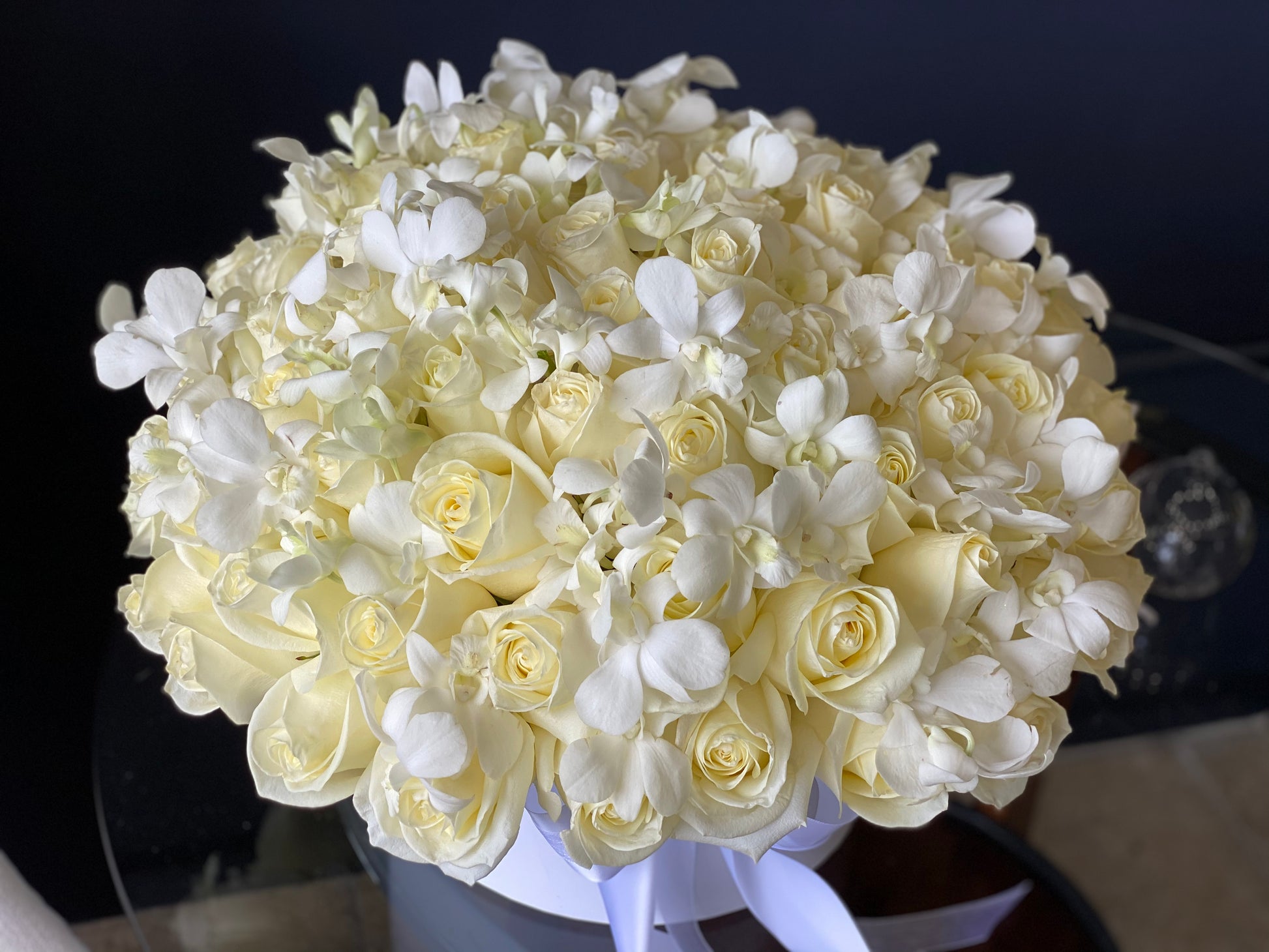 Premium white roses with delicate white orchids Miami