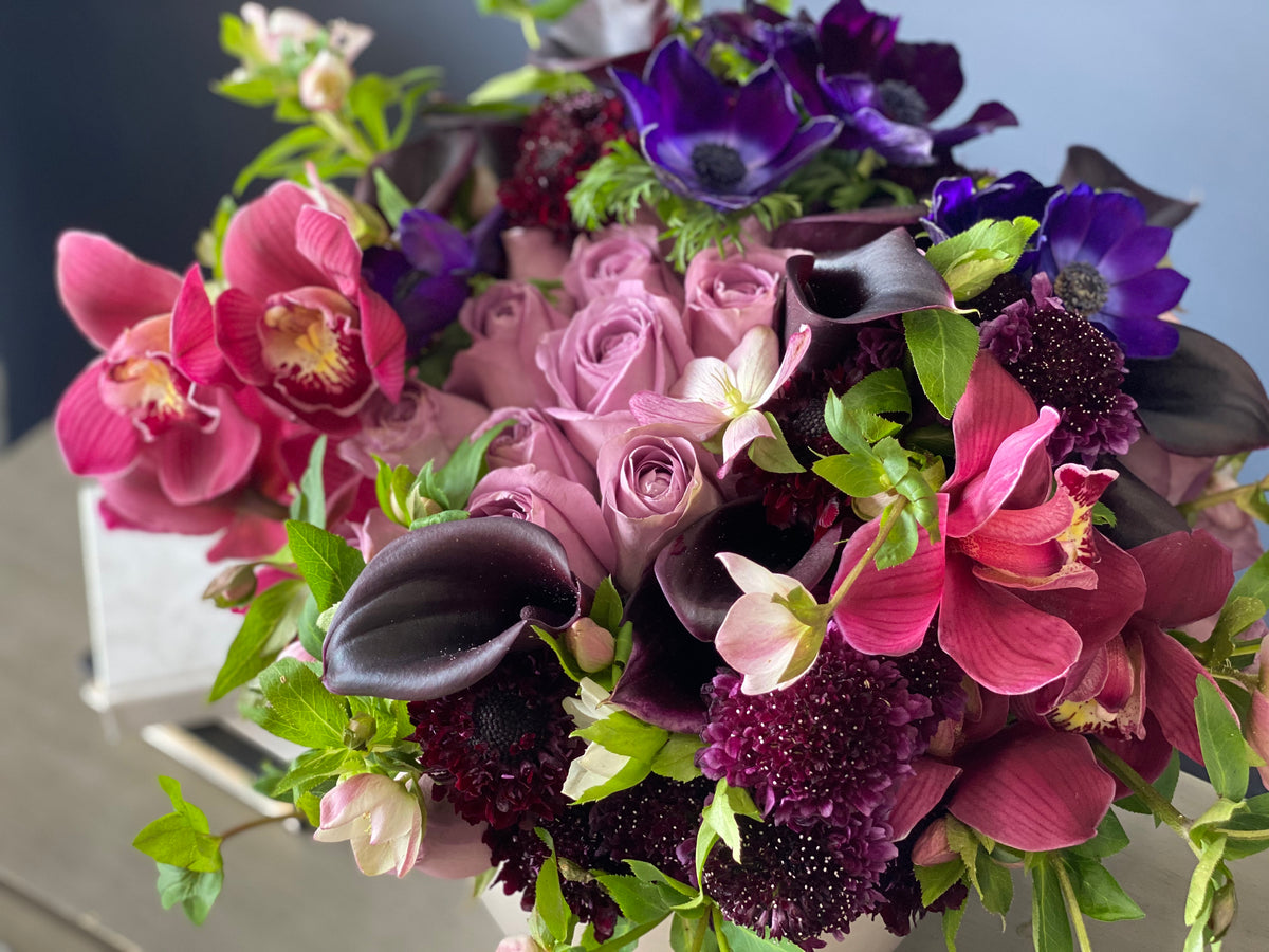 Purple calla lily and rose arrangement Miami