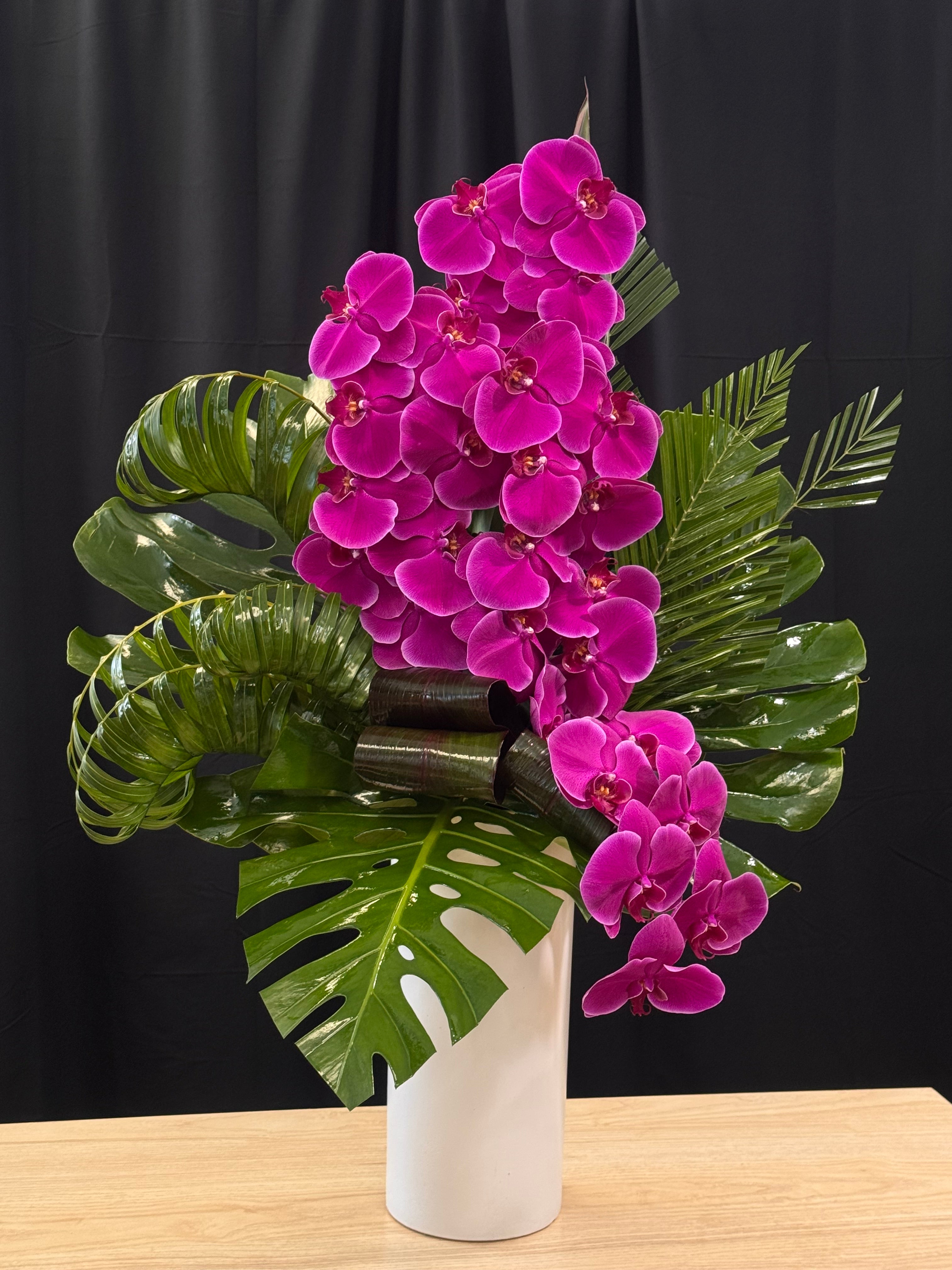 Purple orchid floral design handcrafted by Luxury Flowers Miami