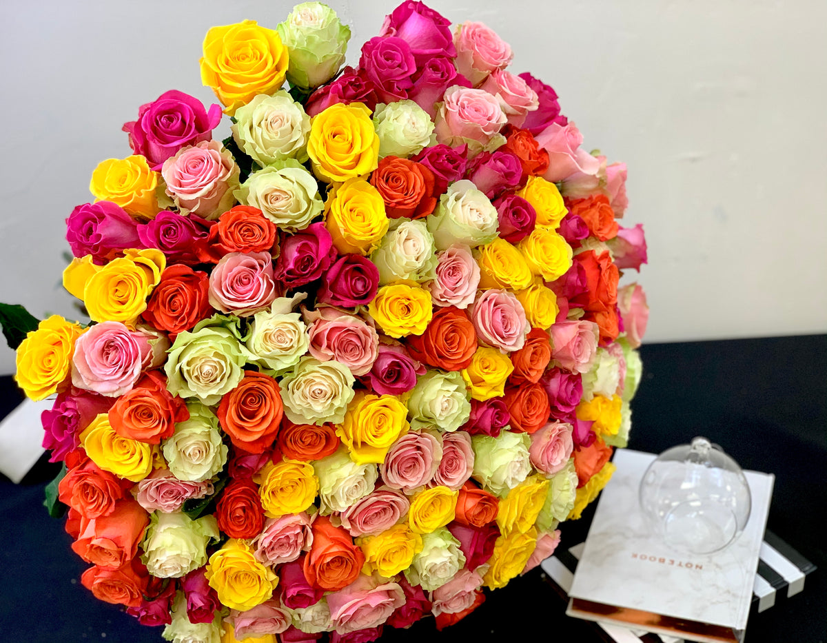 Rainbow rose bouquet with assorted colorful roses Miami Beach