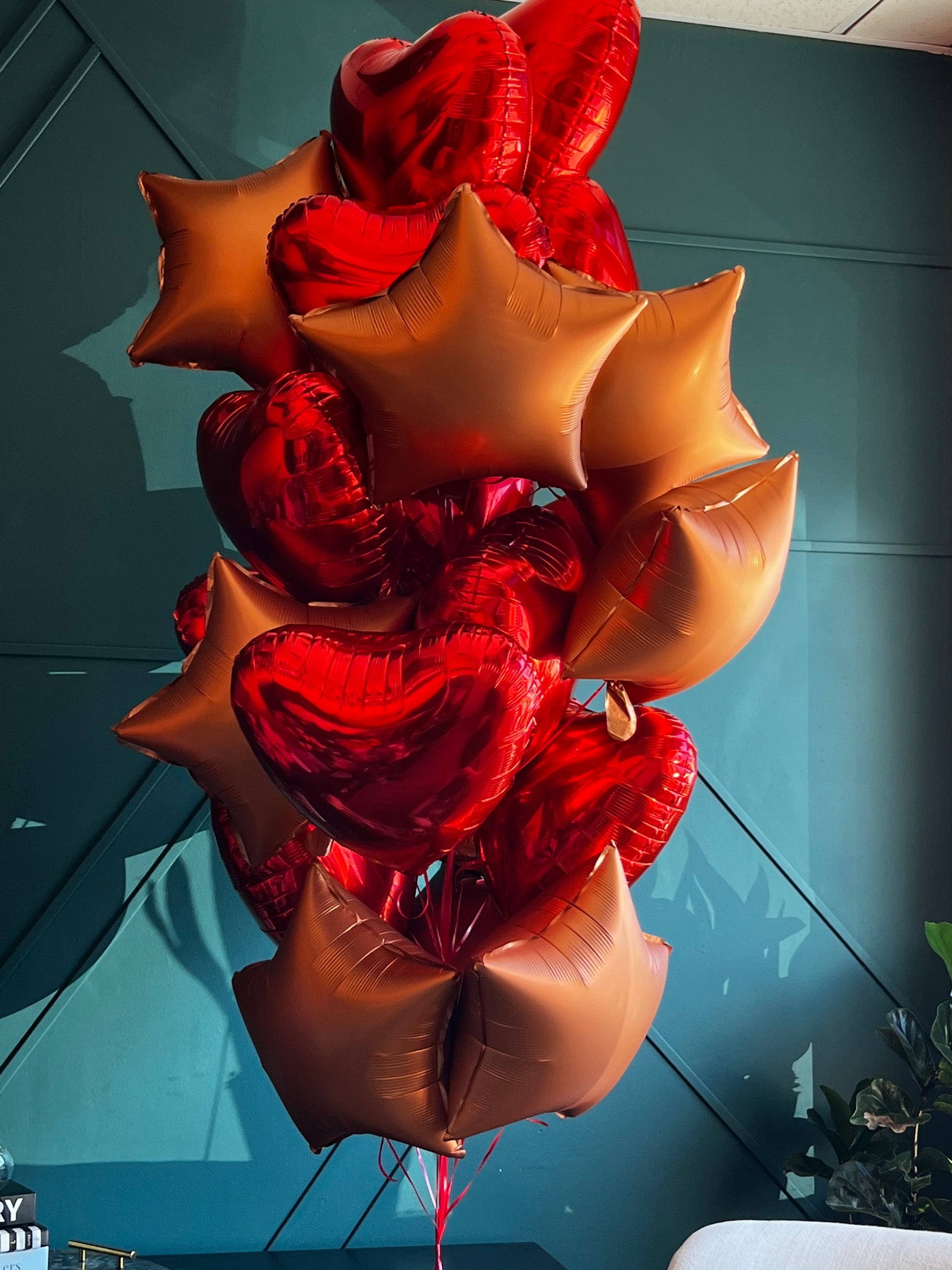 Red and bronze balloon bouquet for birthdays and anniversaries
