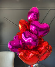 Red and hot pink foil heart balloon bouquet for romantic gifts