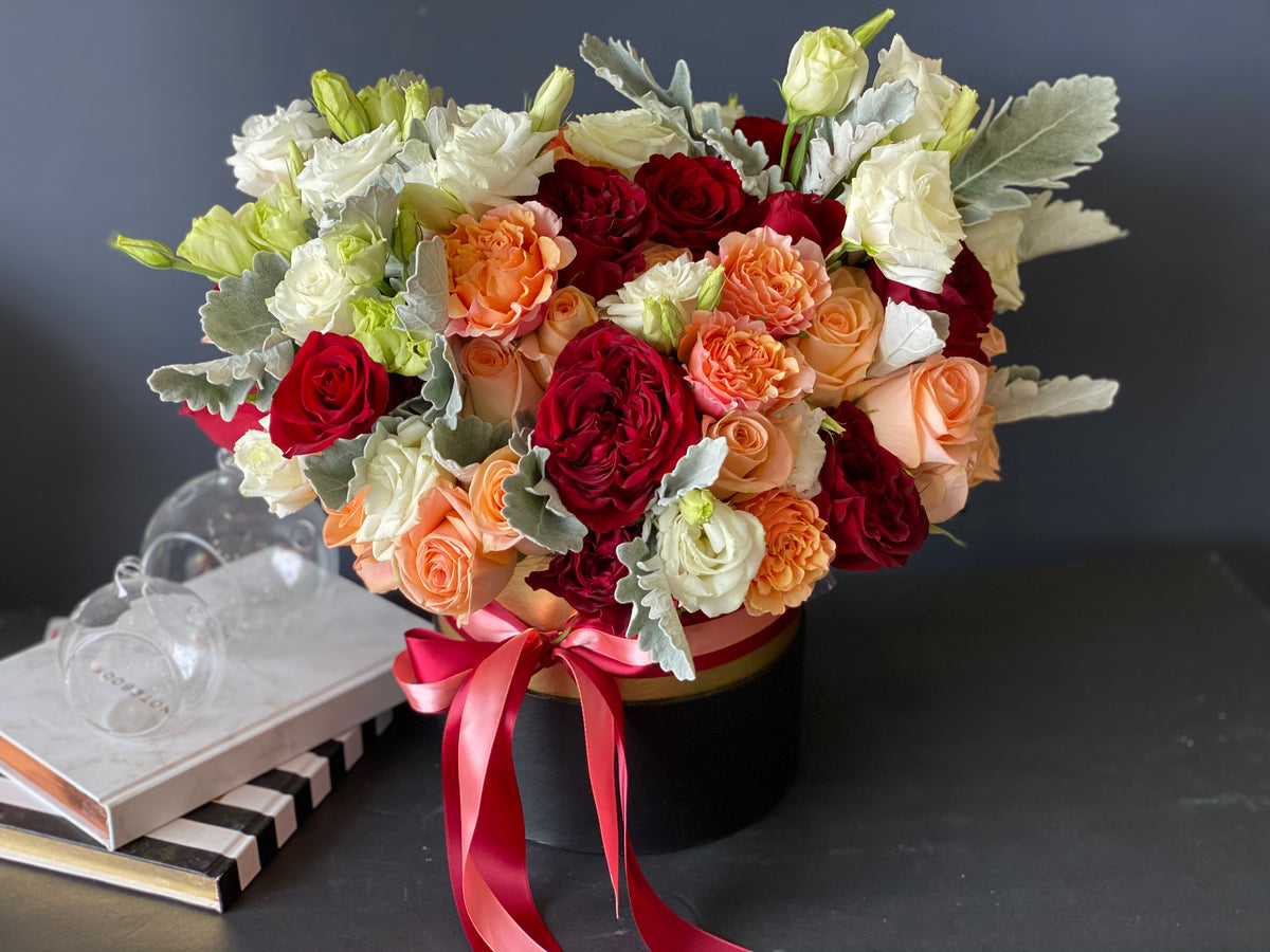 Red and orange fall flowers by Luxury Flowers Miami