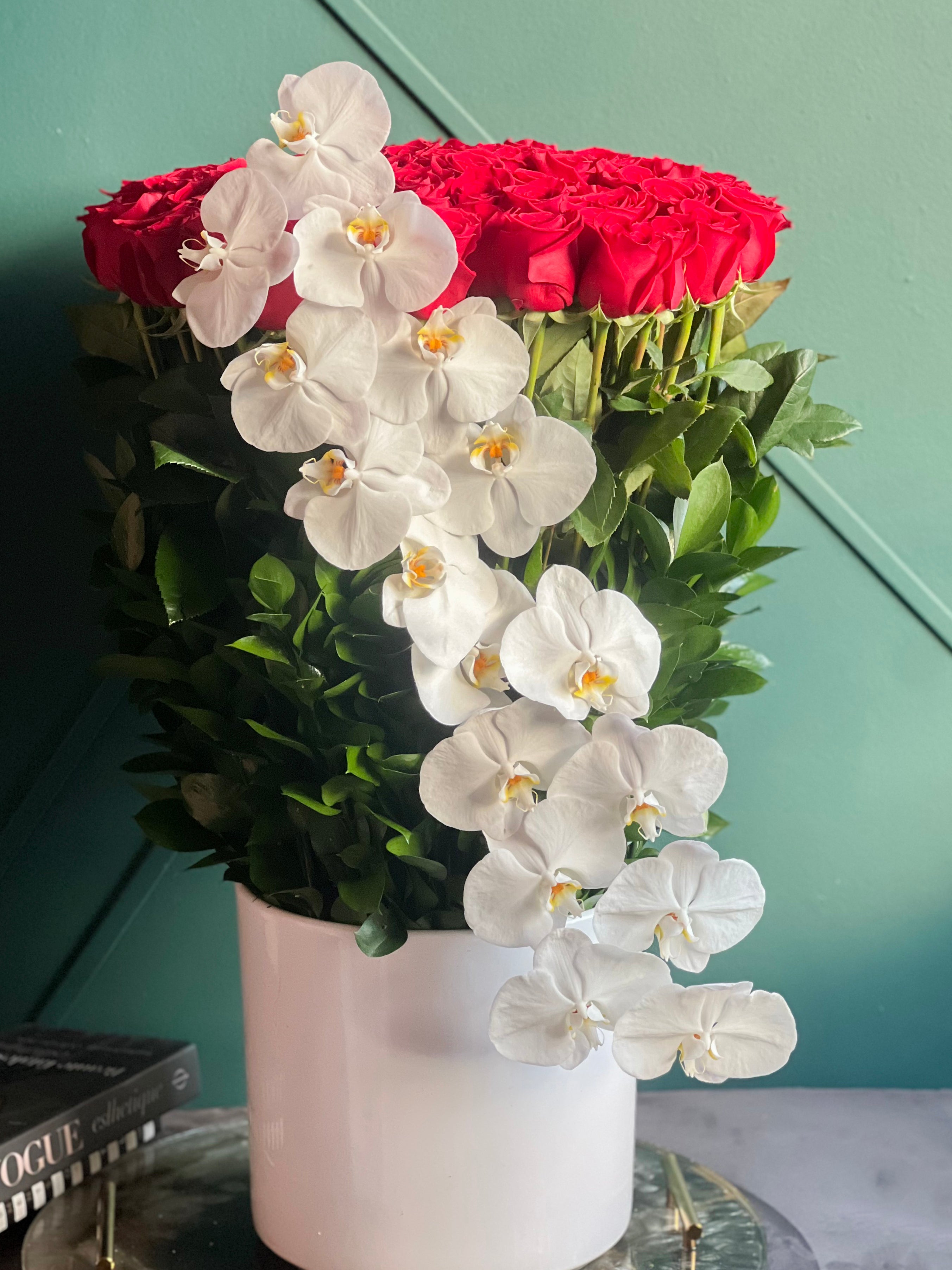 Red roses and white Phalaenopsis orchids for Miami flower delivery