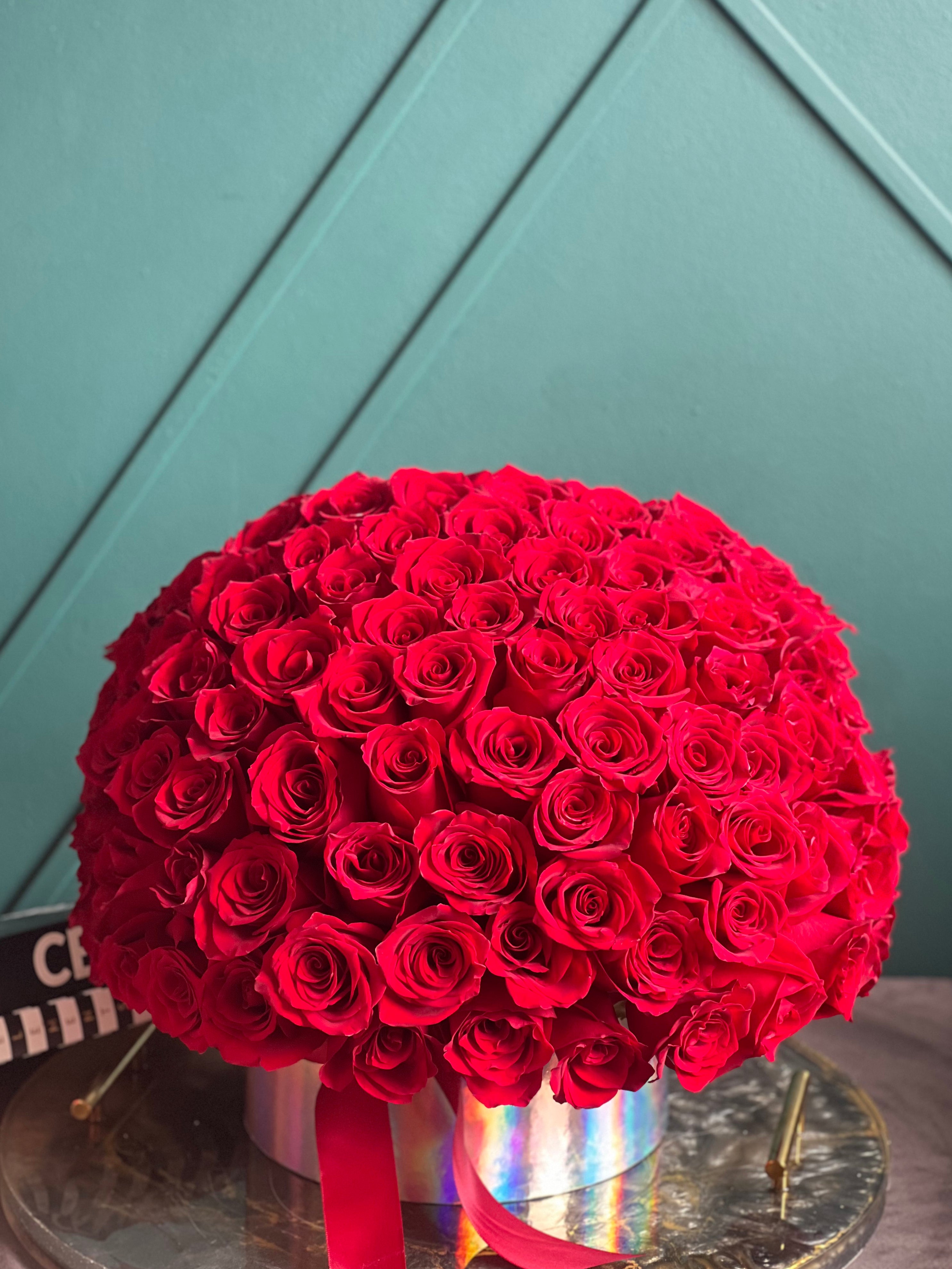 Romantic 100 red roses arrangement Miami
