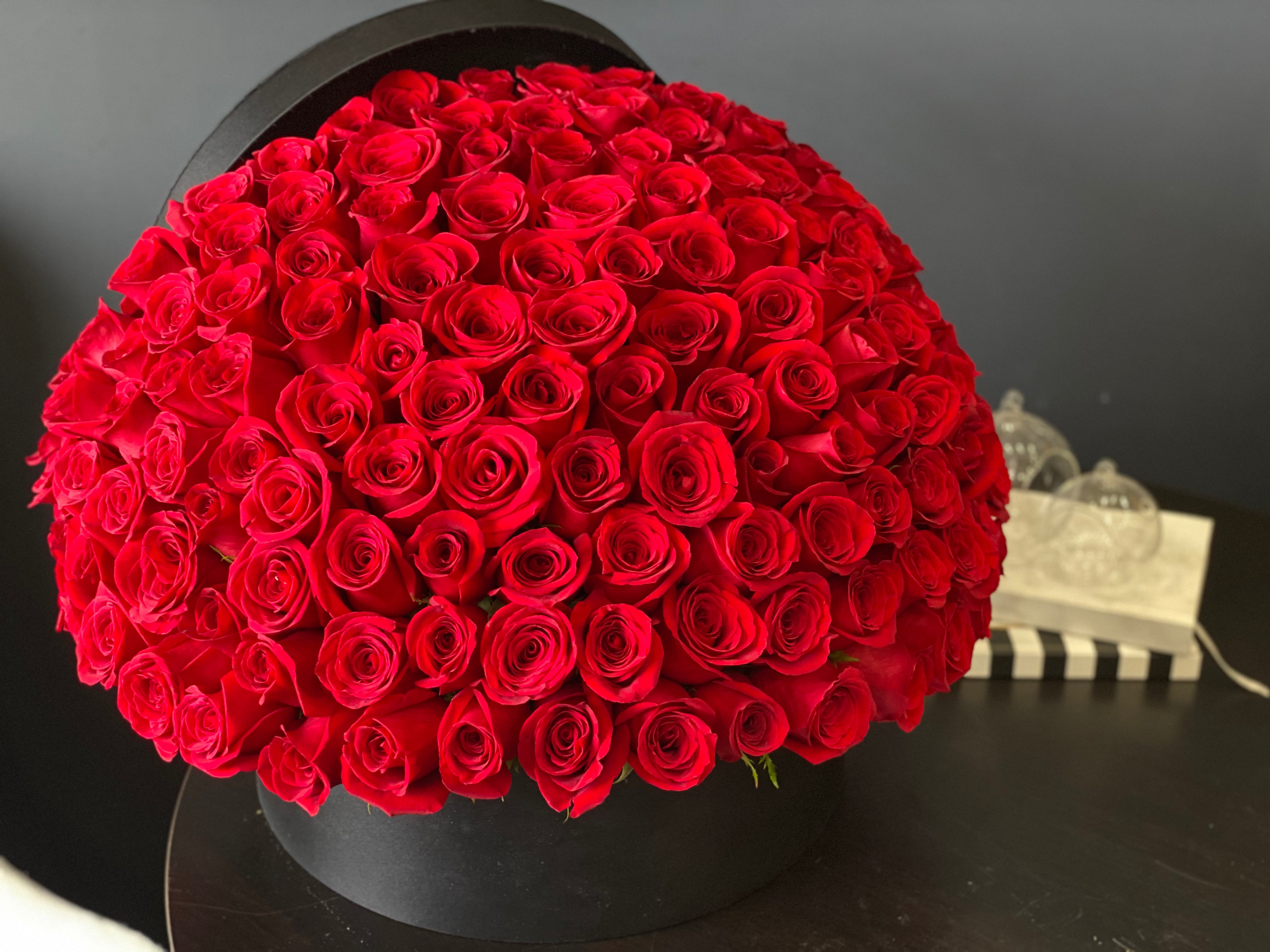 Romantic 150 red roses arrangement for anniversary or proposal in Miami