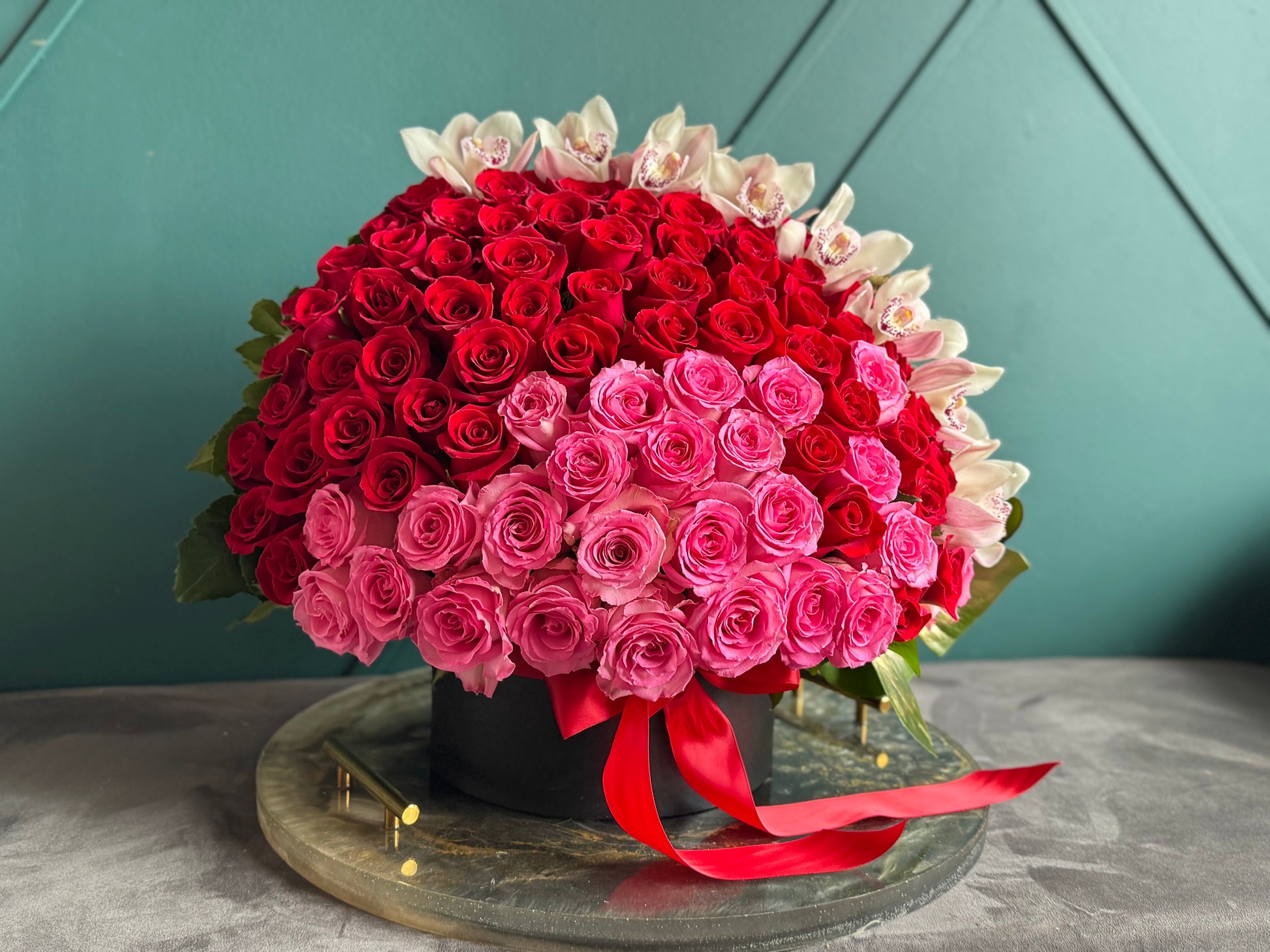 Romantic 150 roses and cymbidium orchid arrangement Miami
