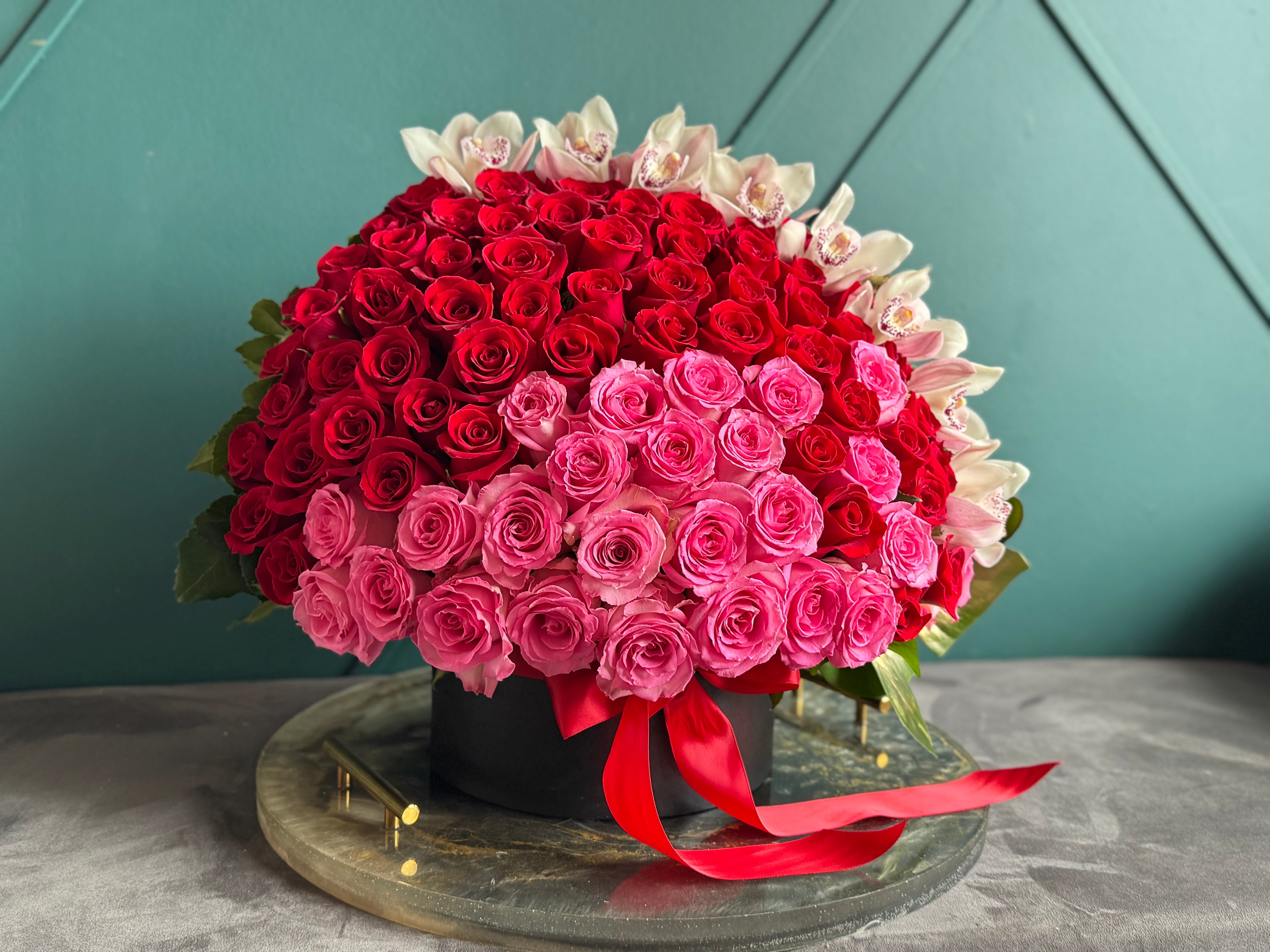 Romantic 150 roses and cymbidium orchid arrangement Miami