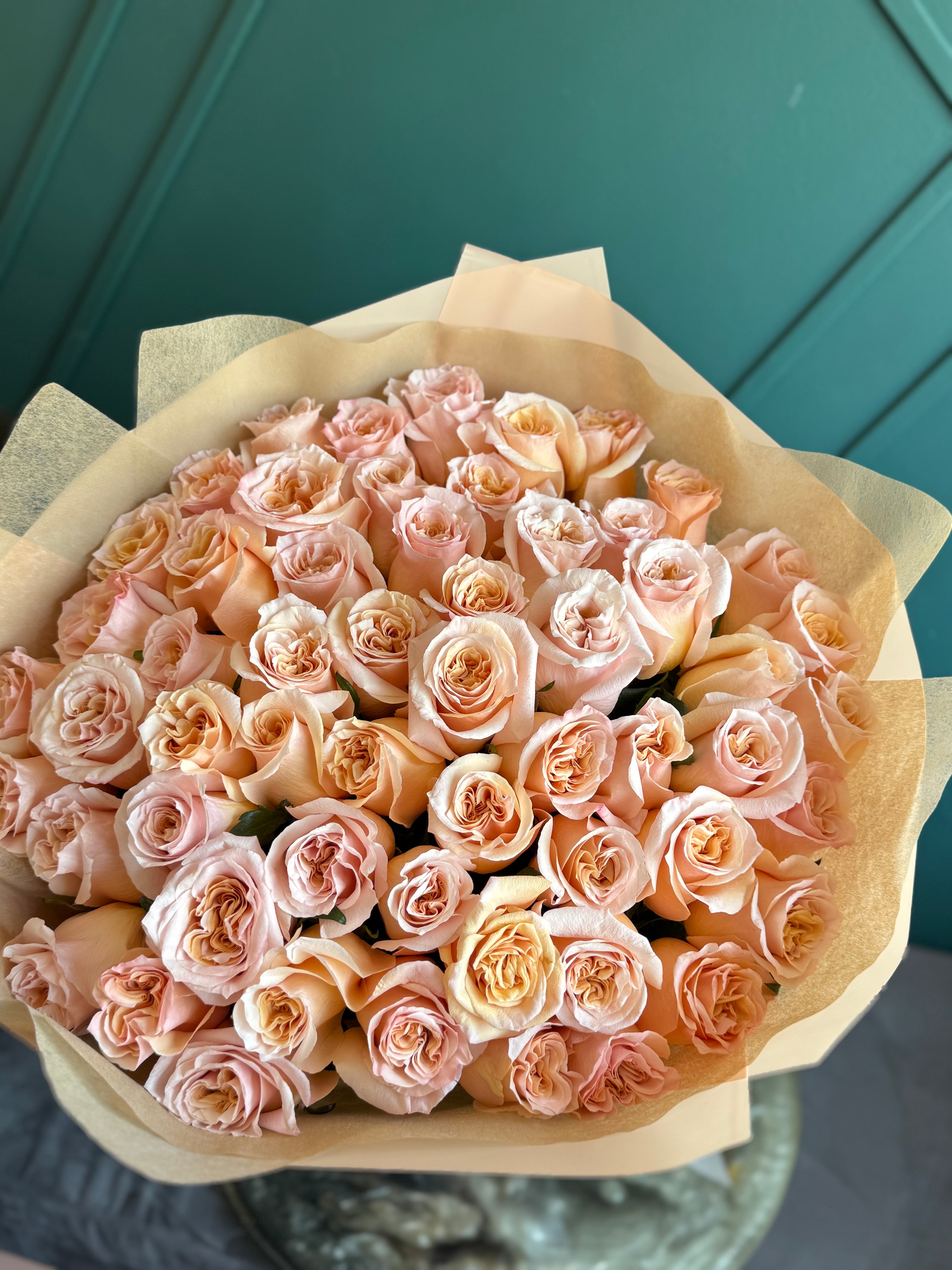 Romantic 50 peach roses bouquet for anniversaries and weddings in Miami