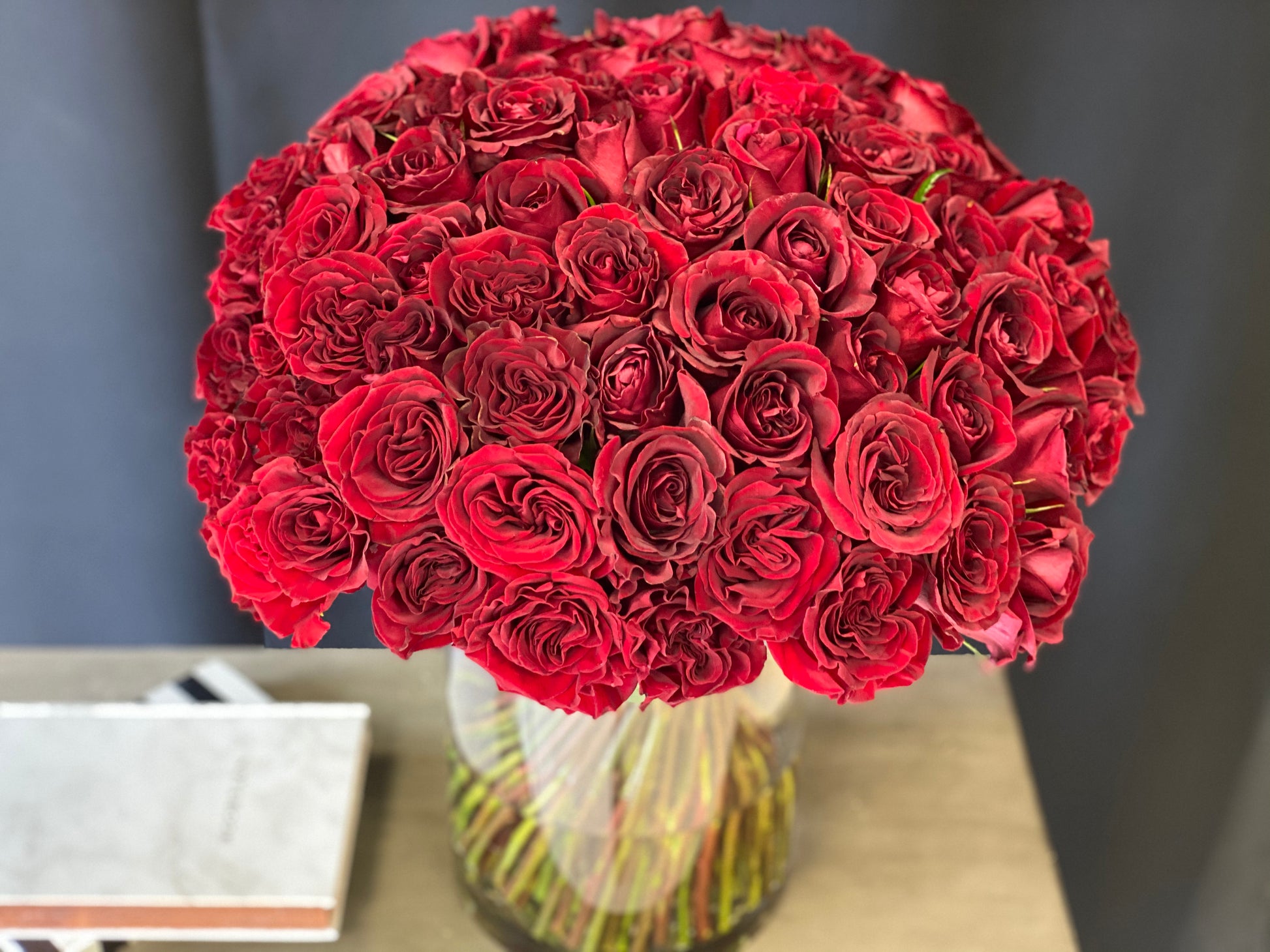 Romantic 50 red roses arrangement for anniversary in Miami
