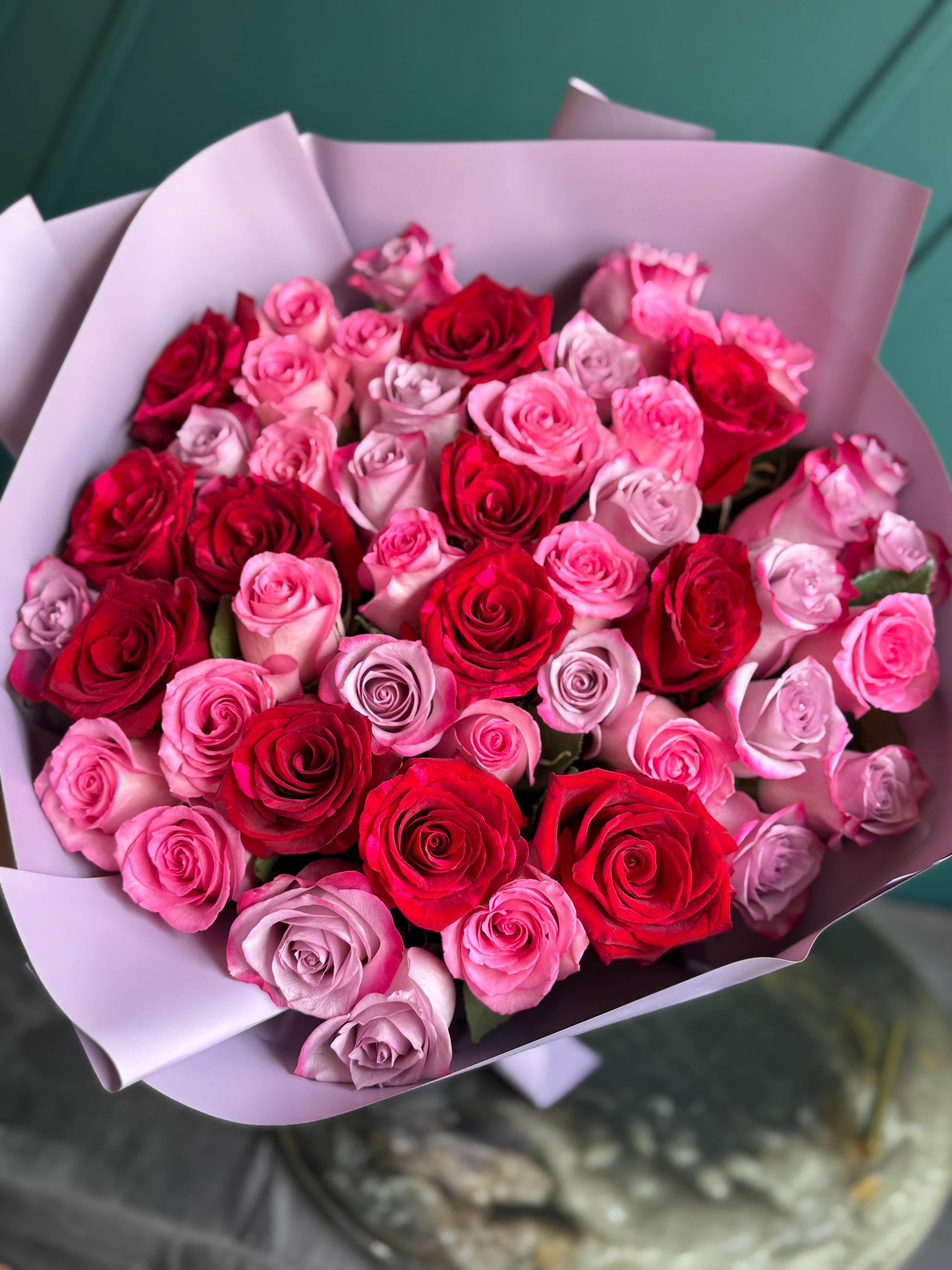 Romantic 50 roses bouquet in red pink and purple